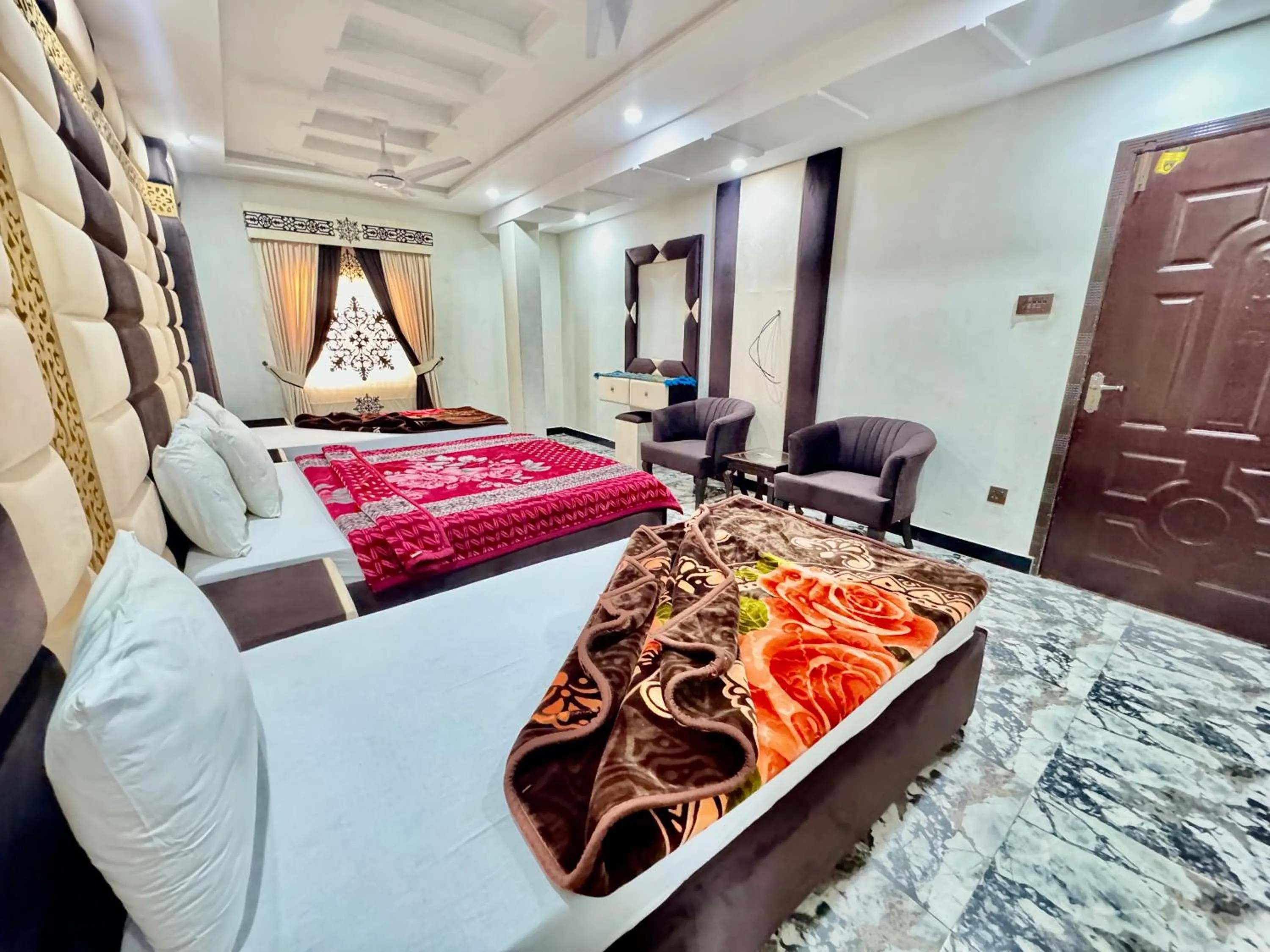 Bedroom in Royal Blue inn Hotel