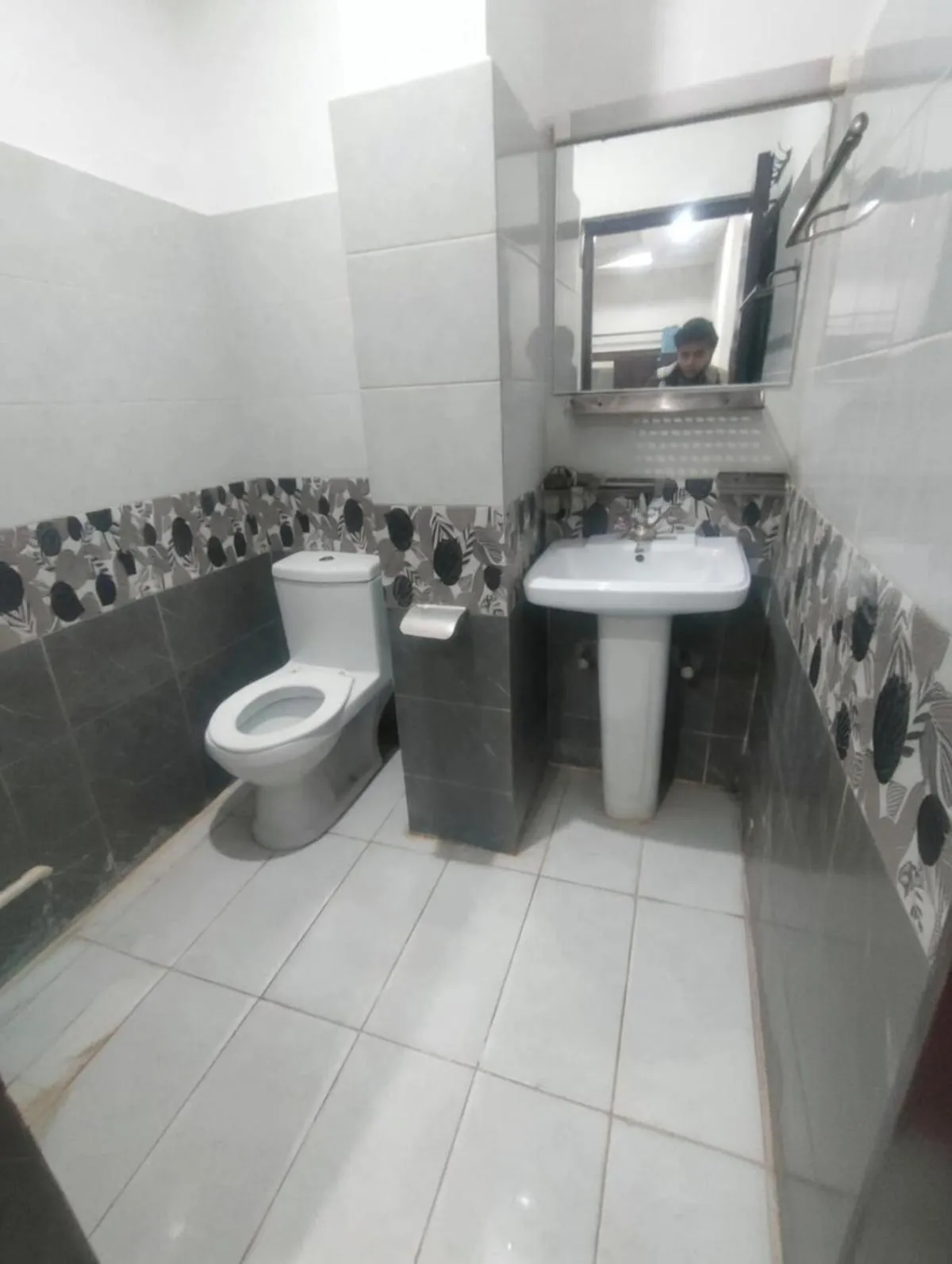 Toilet in Royal Blue inn Hotel