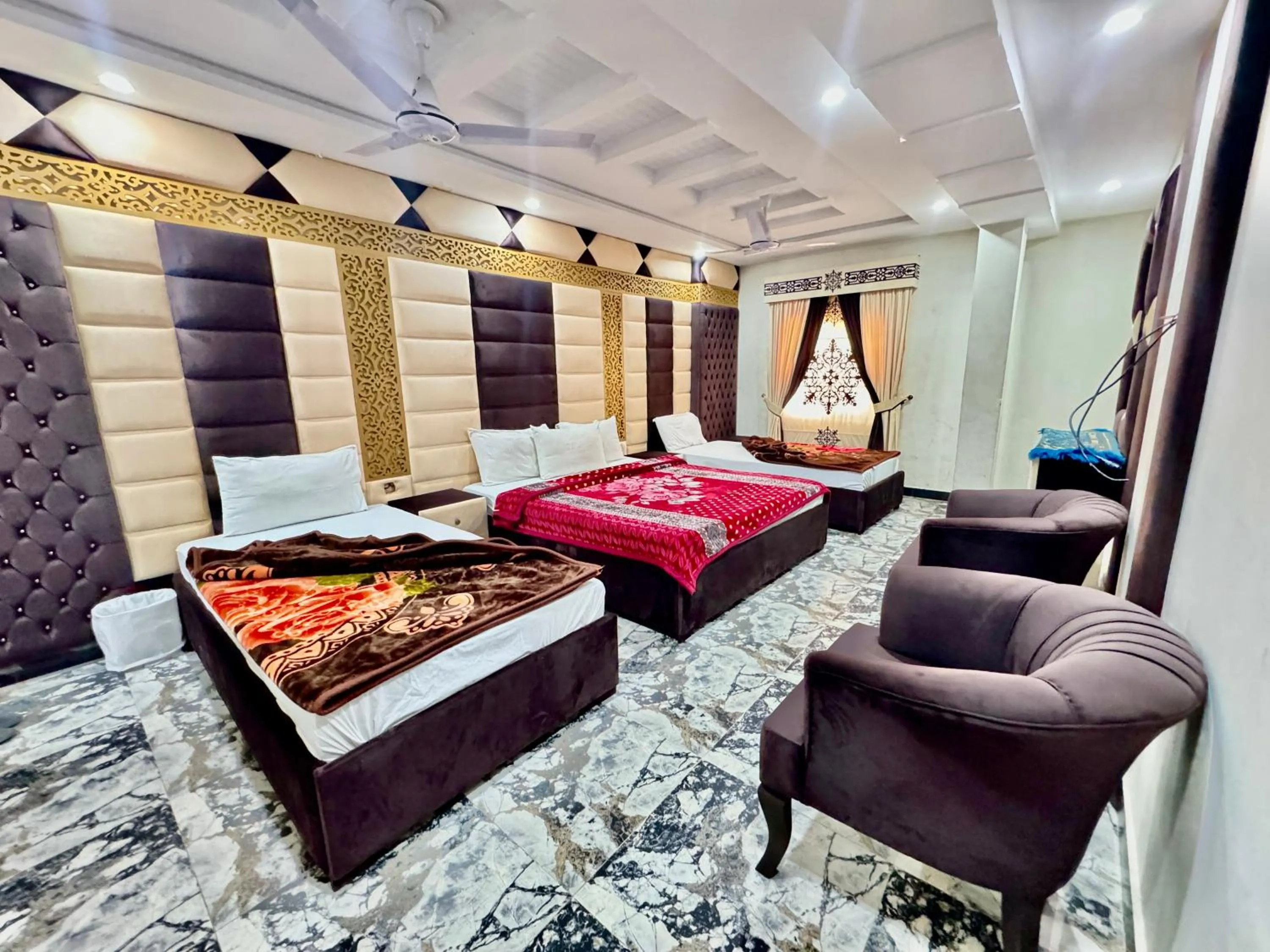 Bedroom in Royal Blue inn Hotel