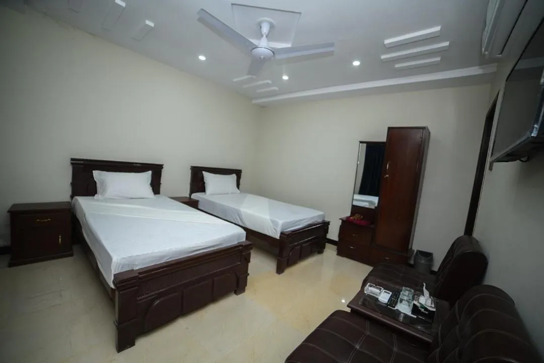 Bedroom in Royal Blue inn Hotel