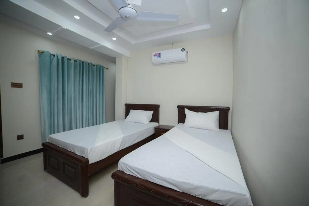 Bedroom in Royal Blue inn Hotel