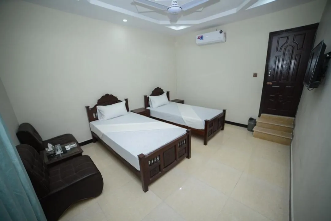 Bedroom in Royal Blue inn Hotel