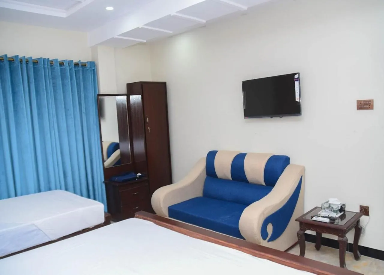 Bedroom in Royal Blue inn Hotel