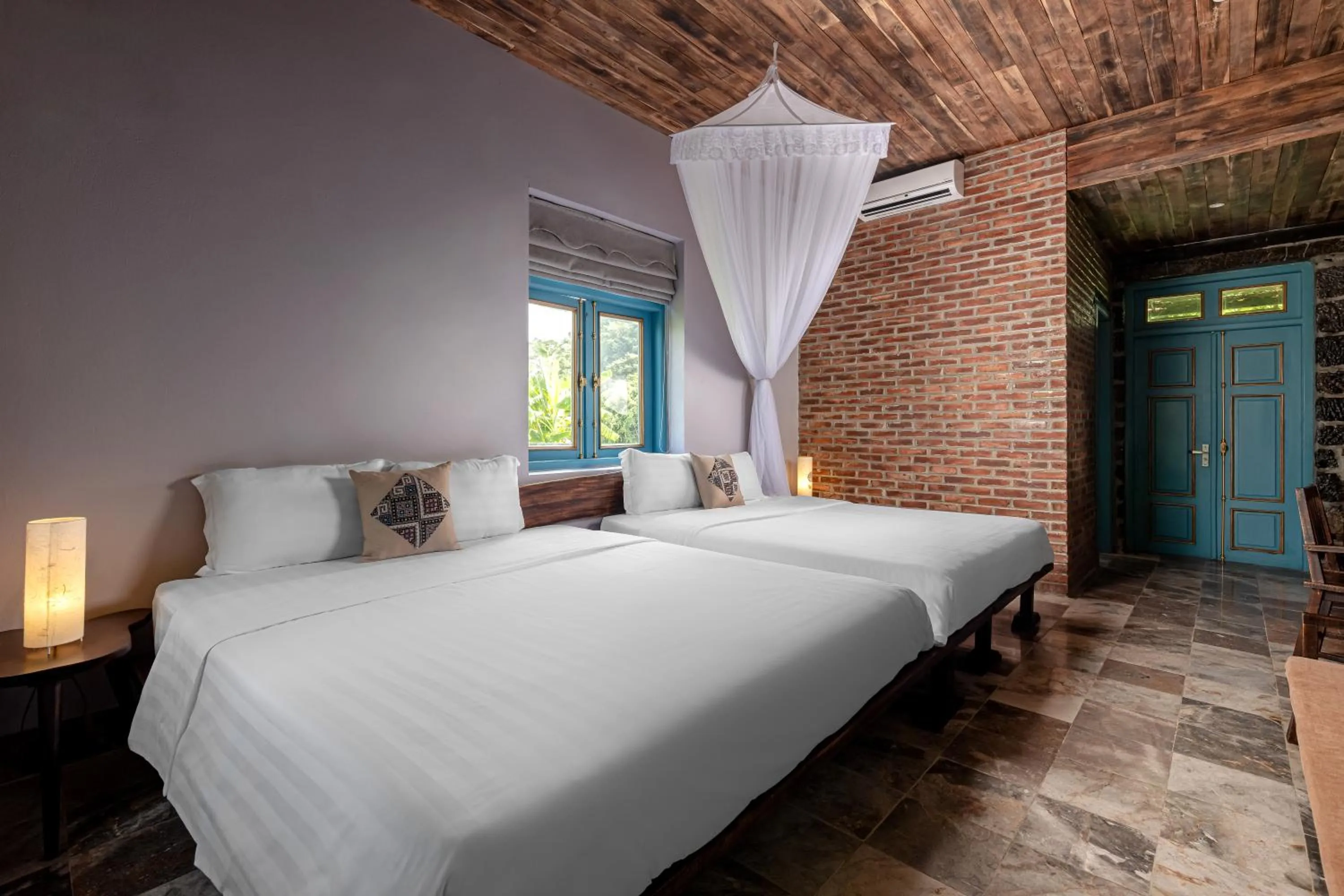 Bed in ChezCao Rice Field Ecolodge Ninh Binh