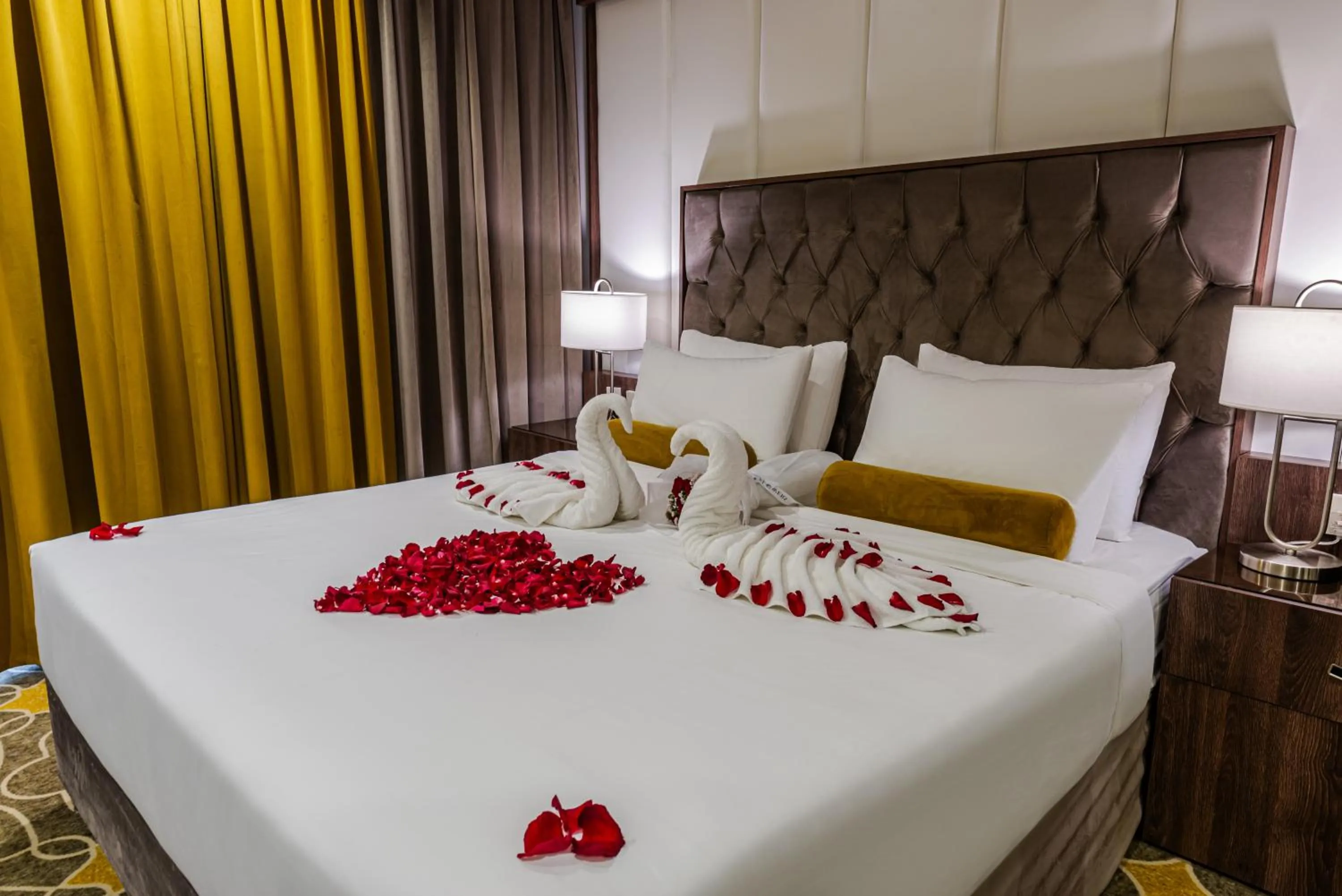 Bed in Abha Gardn Millennium Hotel