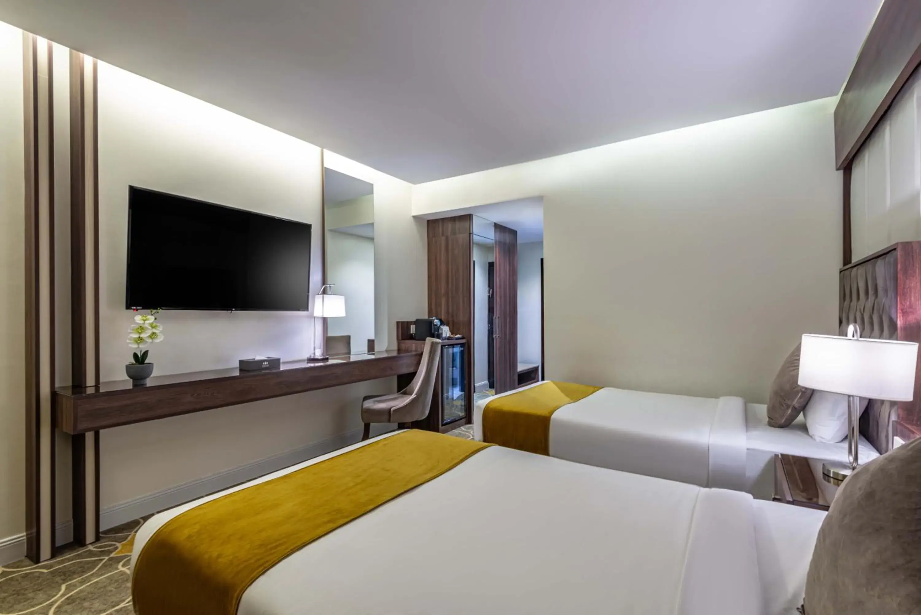 TV and multimedia, Bed in Abha Gardn Millennium Hotel TV and multimedia, Bed in Abha Gardn Millennium Hotel