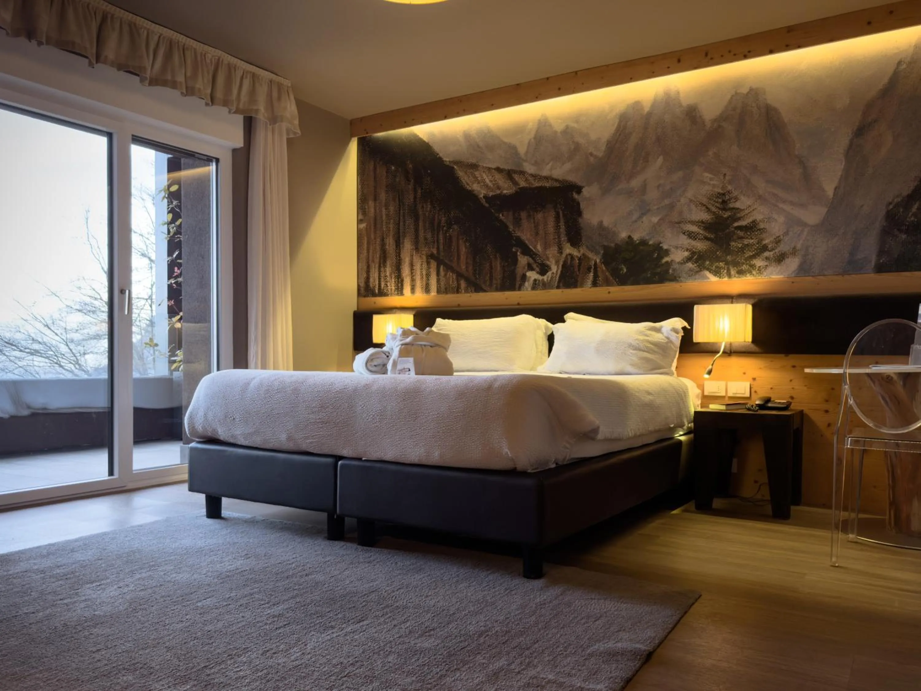 Photo of the whole room, Bed in Alp & Wellness Sport Hotel Panorama