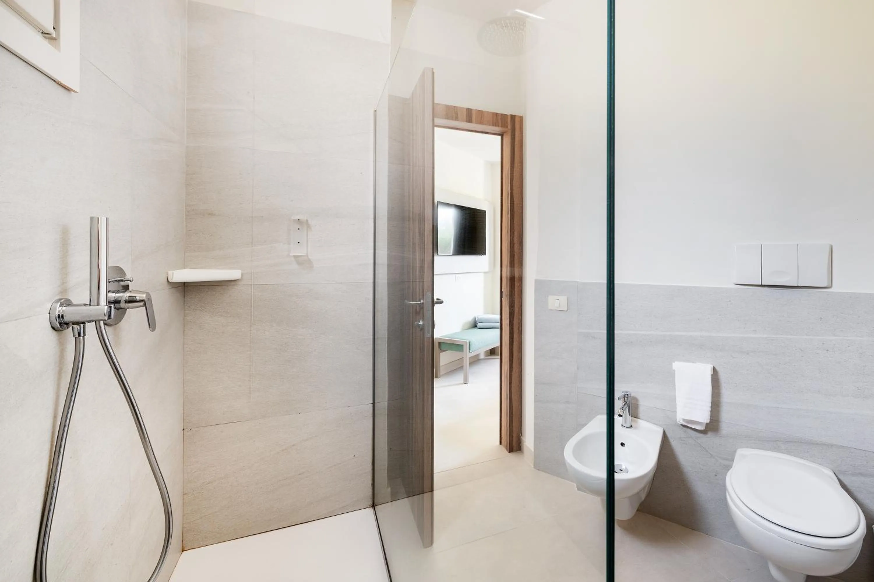 Bathroom in VOI Arenella Resort