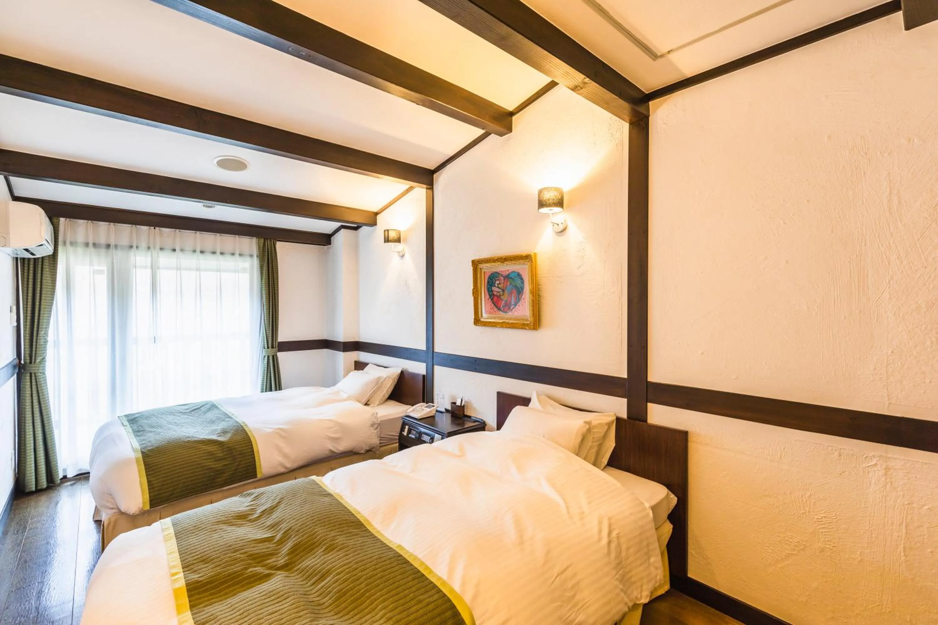 Bed in Hotel Jogakura