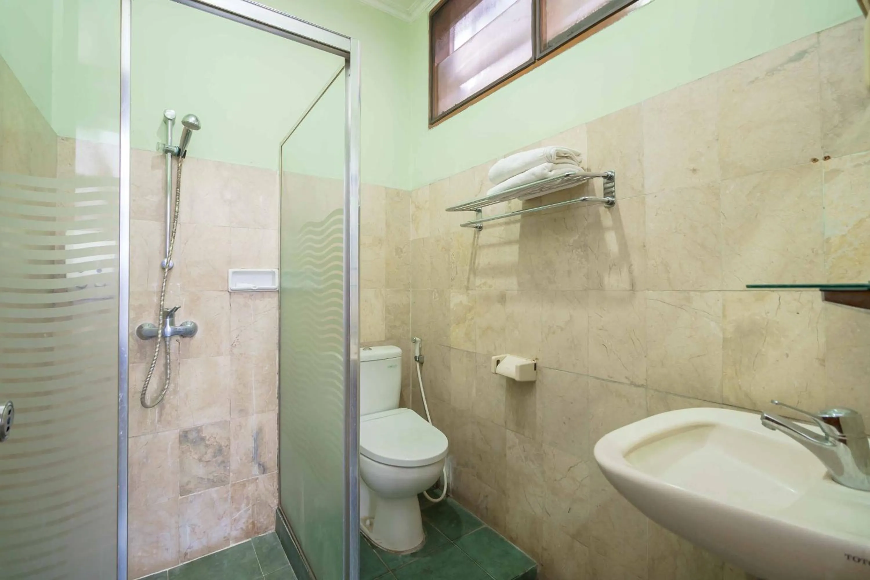 Bathroom in RedDoorz Plus near Kemang Raya