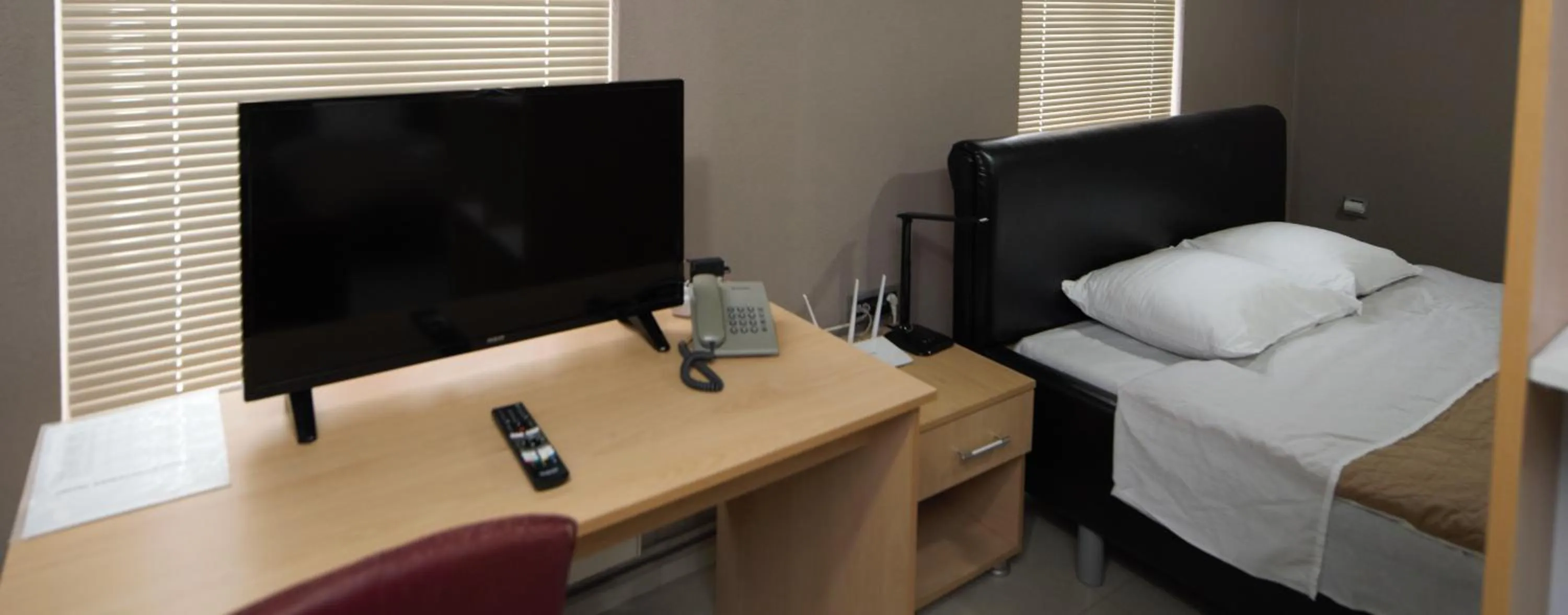 Bed in Hotel Ambasador