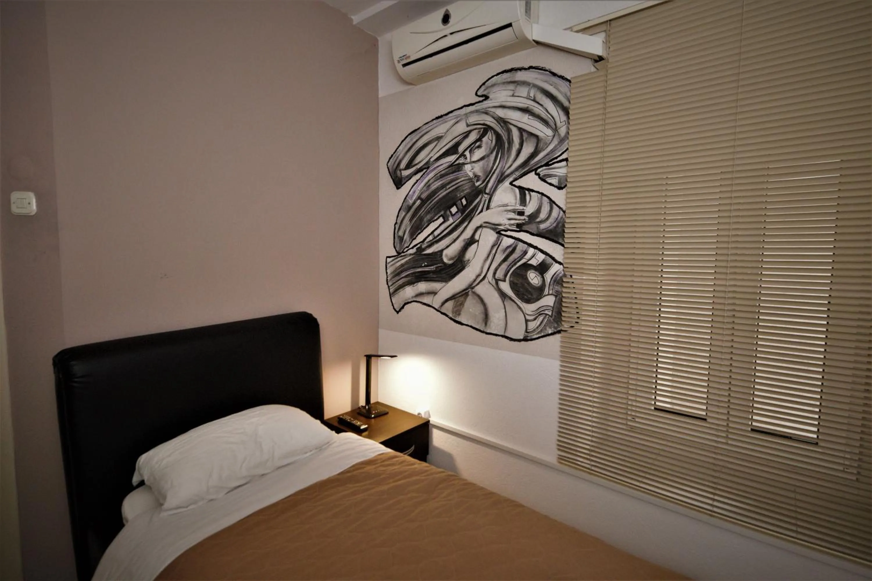 Bed in Hotel Ambasador