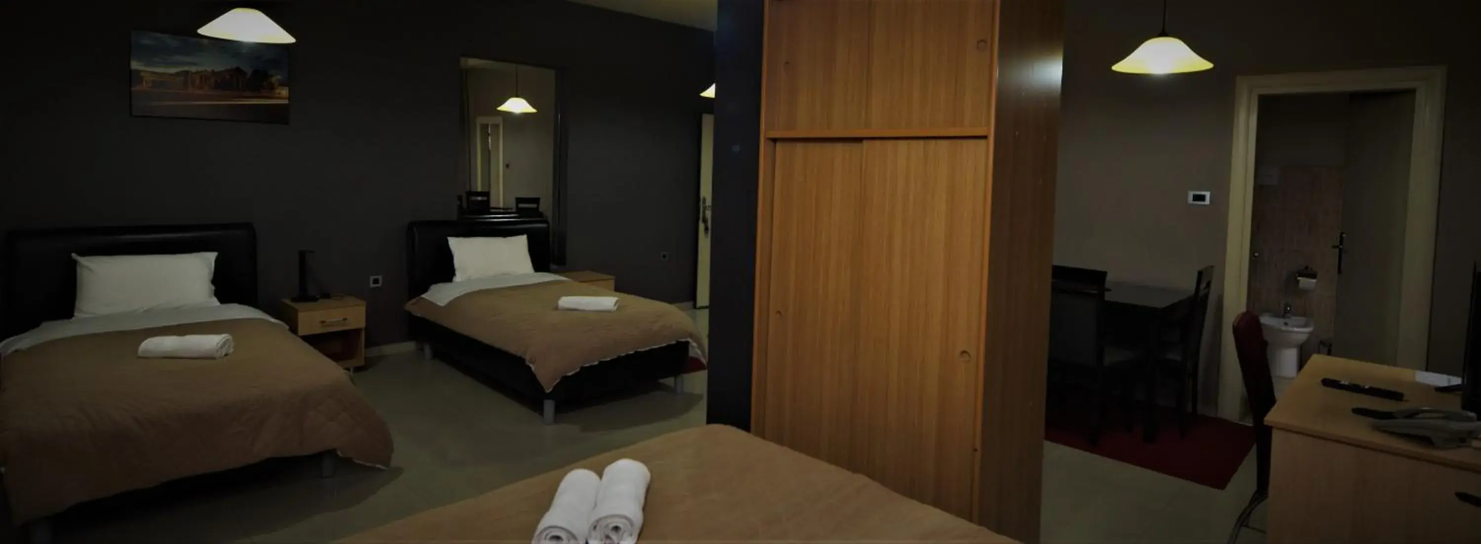Quadruple Room - single occupancy in Hotel Ambasador Quadruple Room - single occupancy in Hotel Ambasador