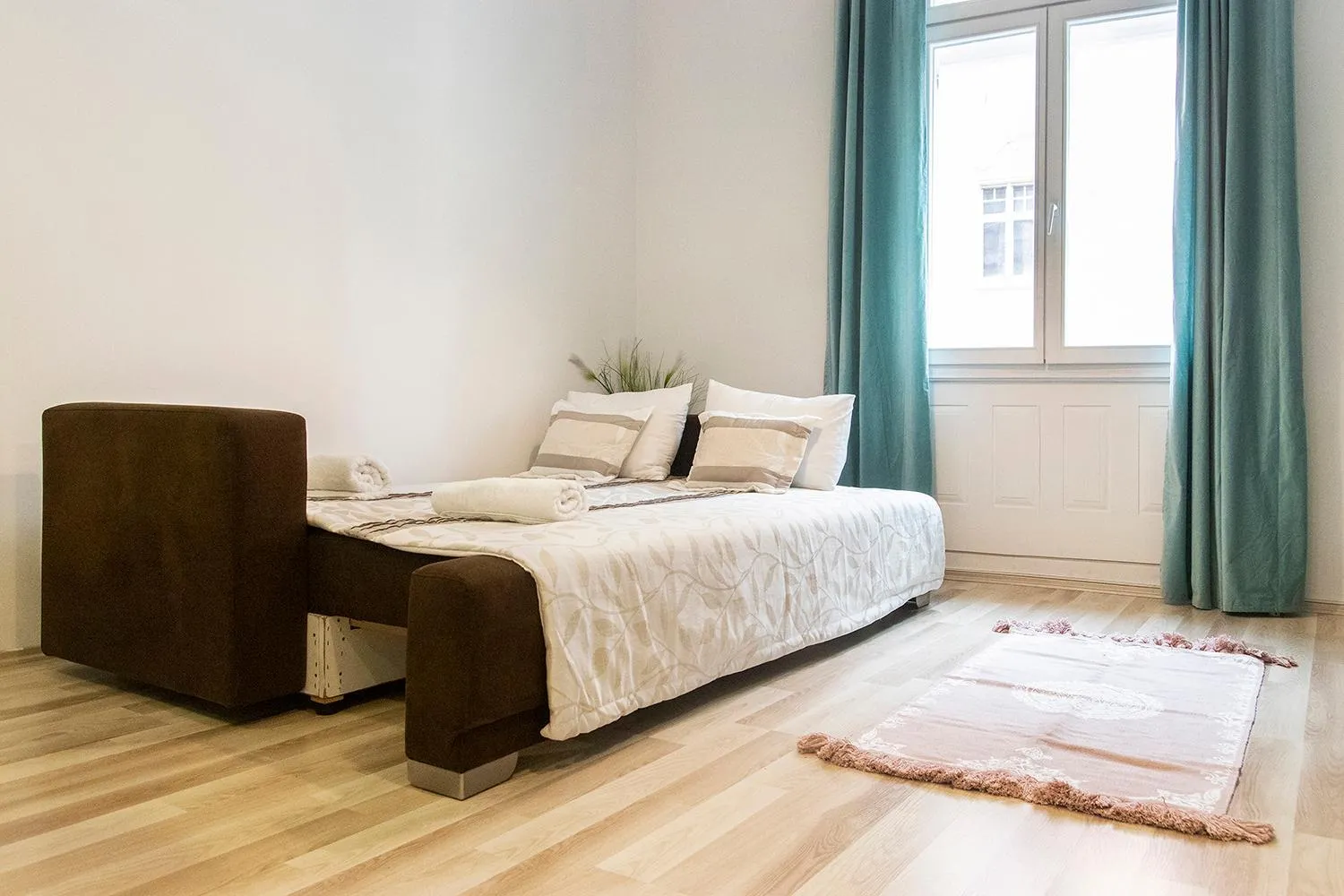Living room, Bed in Real Apartments Semmelweis II