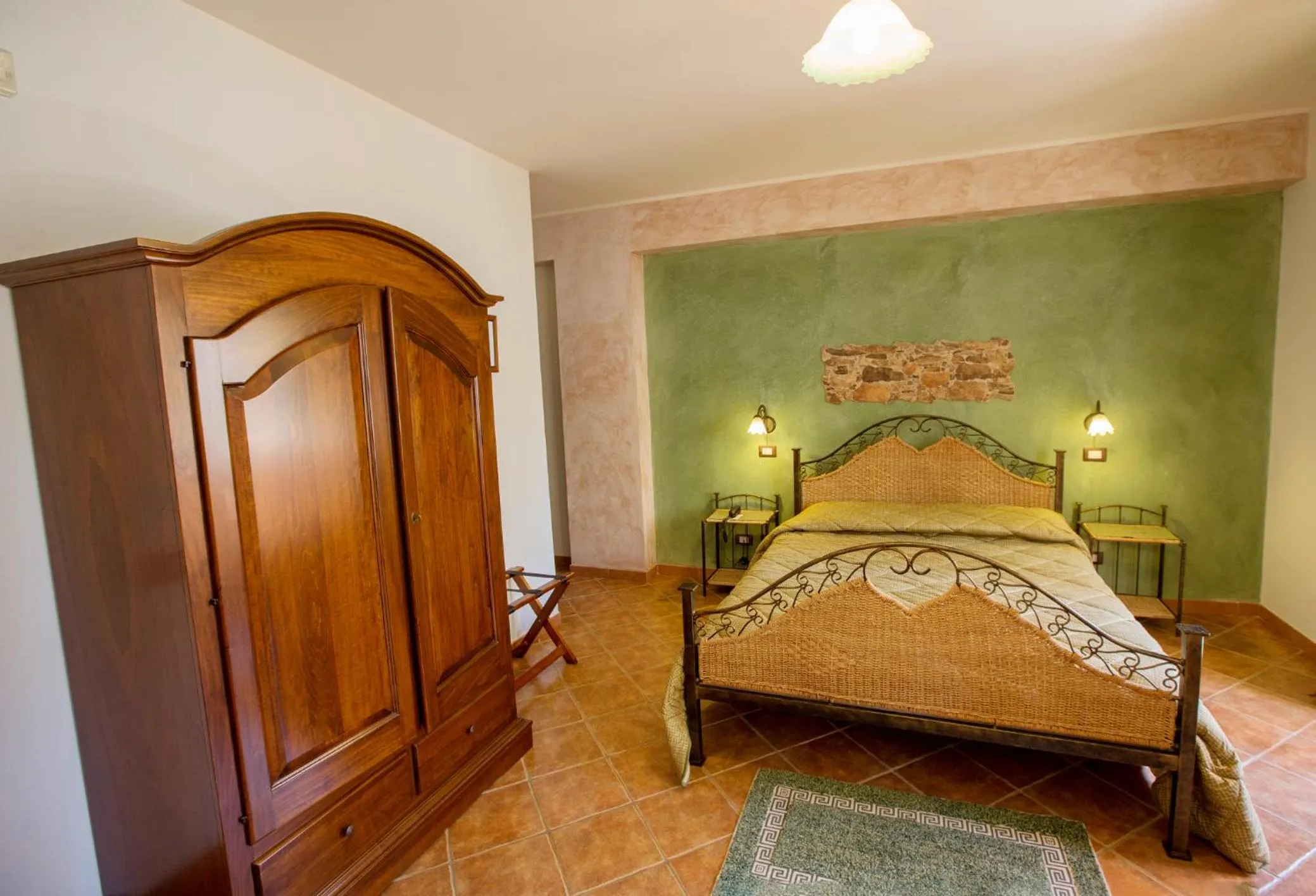 Bed in Sikania Suite