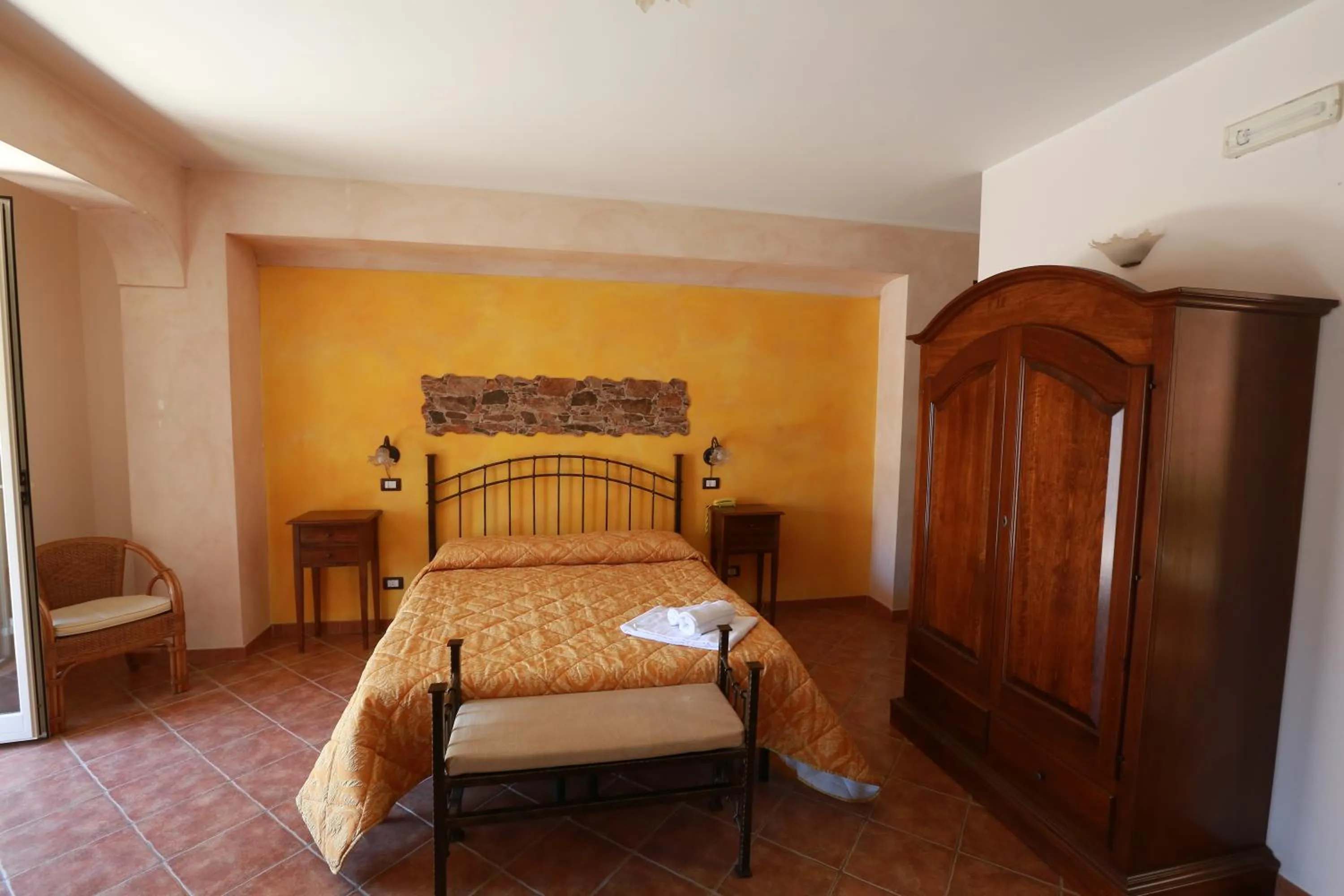 Bed in Sikania Suite