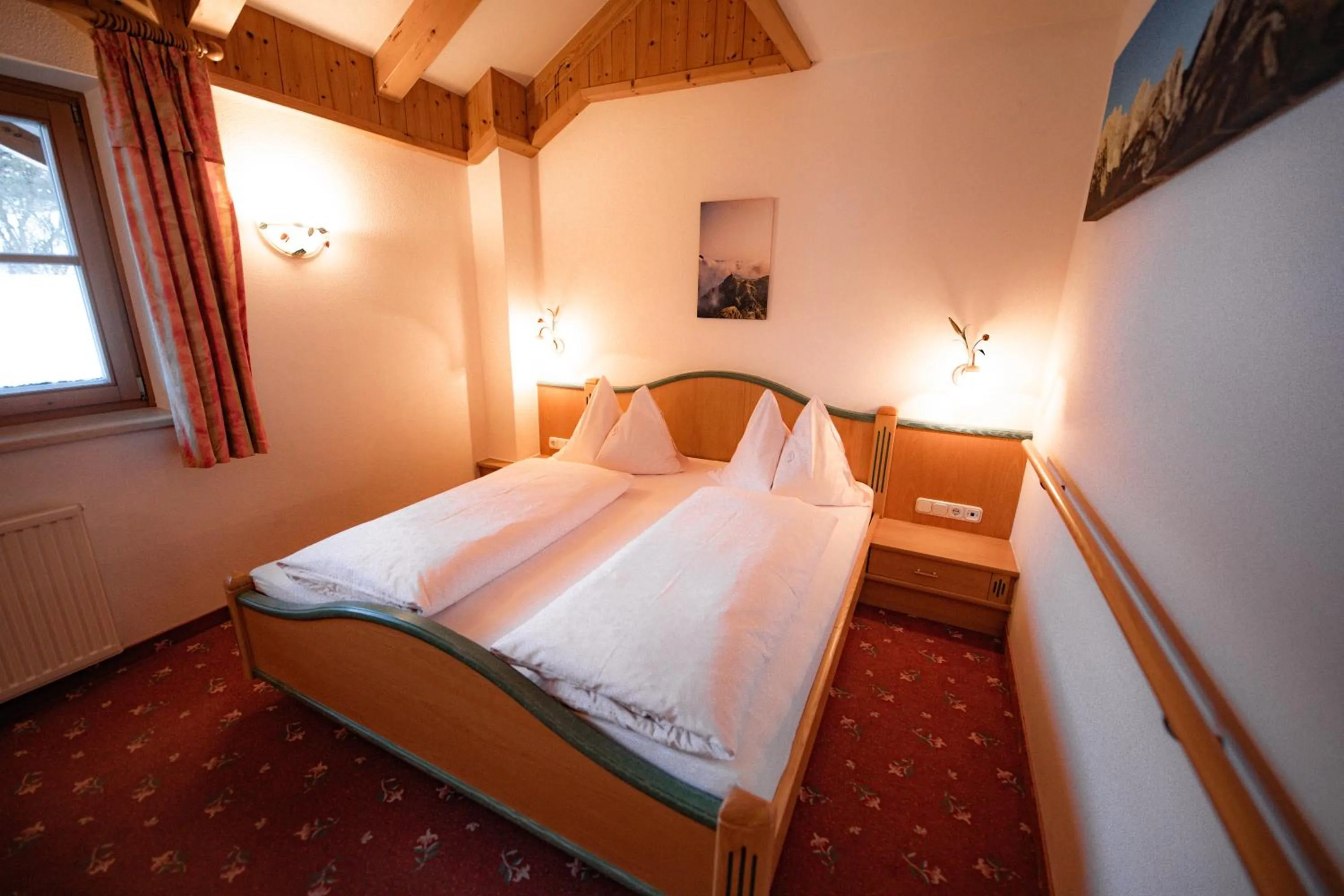 Bed in Zimmer & Ferienwohnungen Dandler