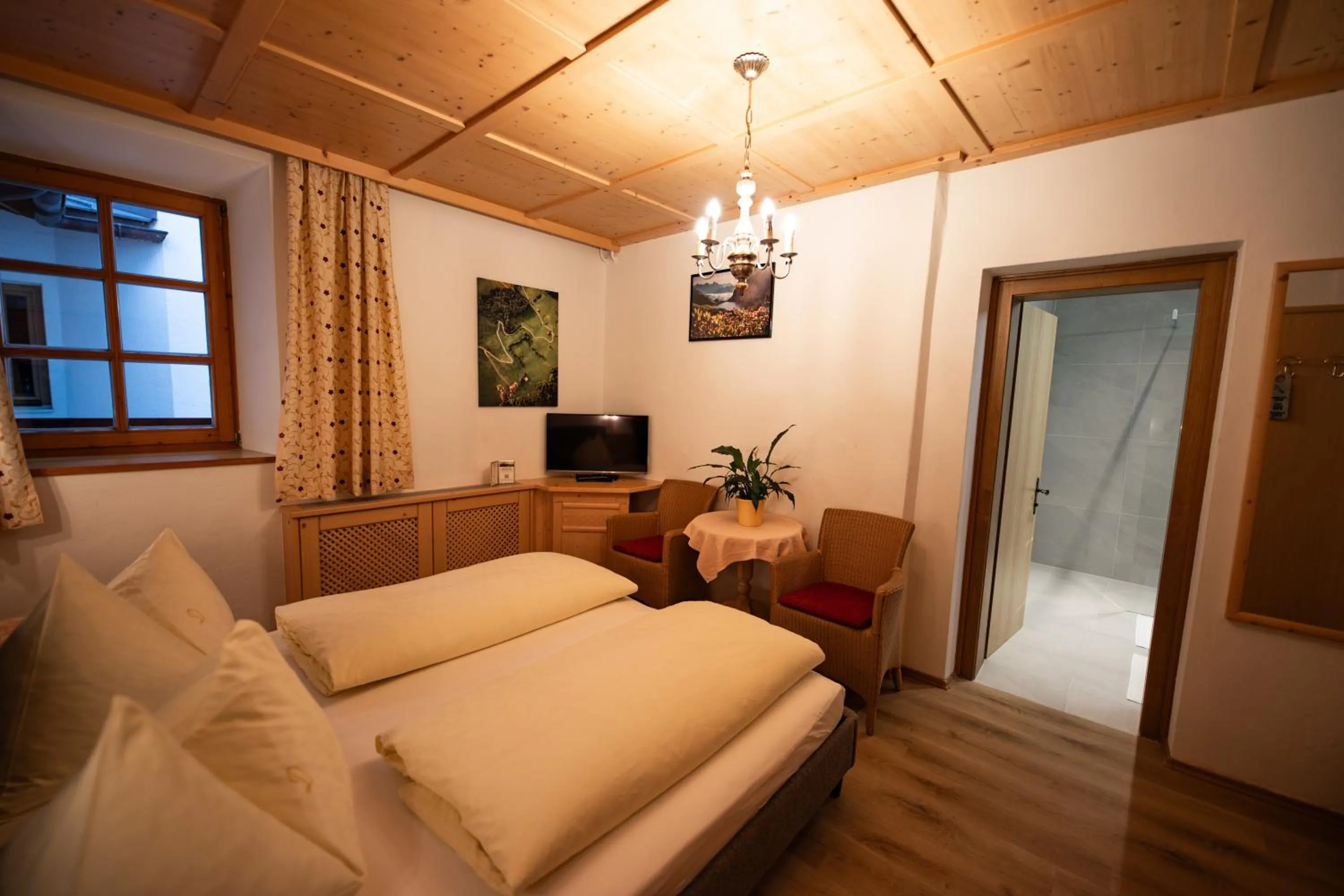 Bed in Zimmer & Ferienwohnungen Dandler