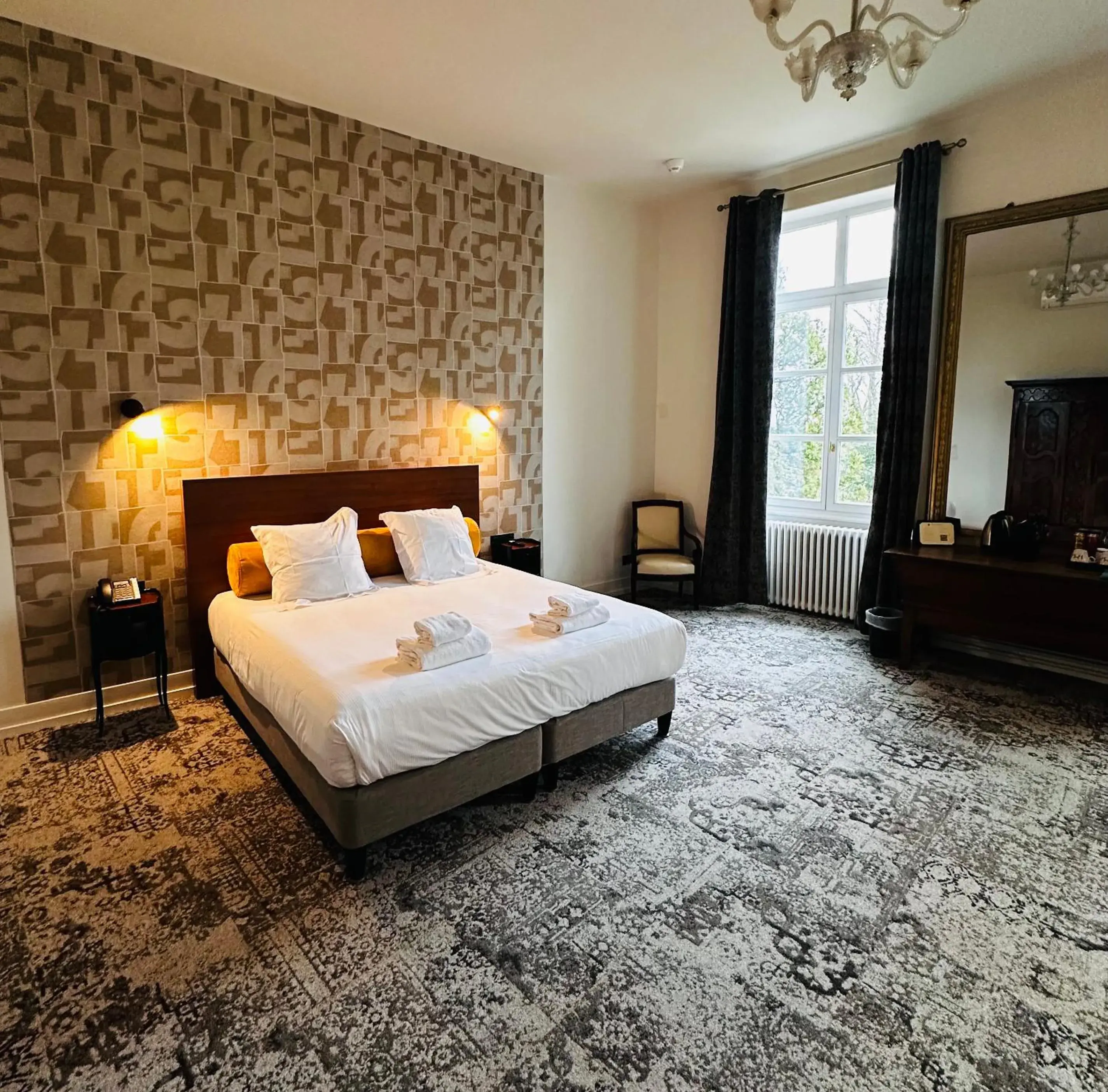 Photo of the whole room, Bed in Logis Hôtels Château de La Barge Photo of the whole room, Bed in Logis Hôtels Château de La Barge