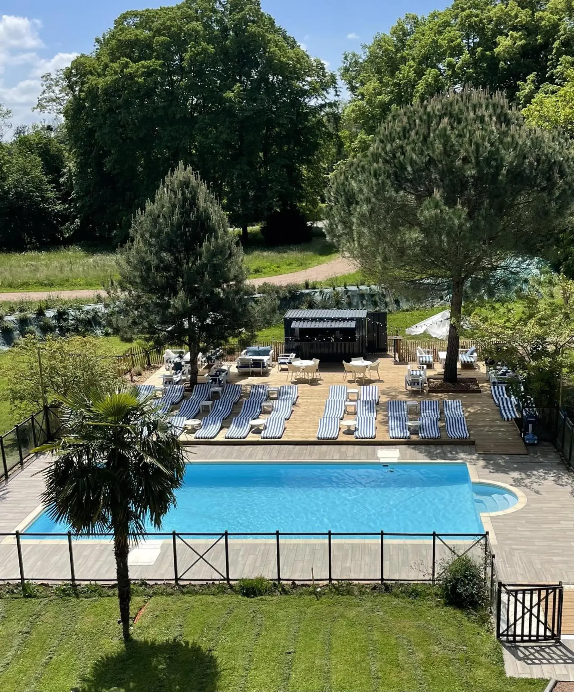 Swimming pool in Logis Hôtels Château de La Barge Swimming pool in Logis Hôtels Château de La Barge