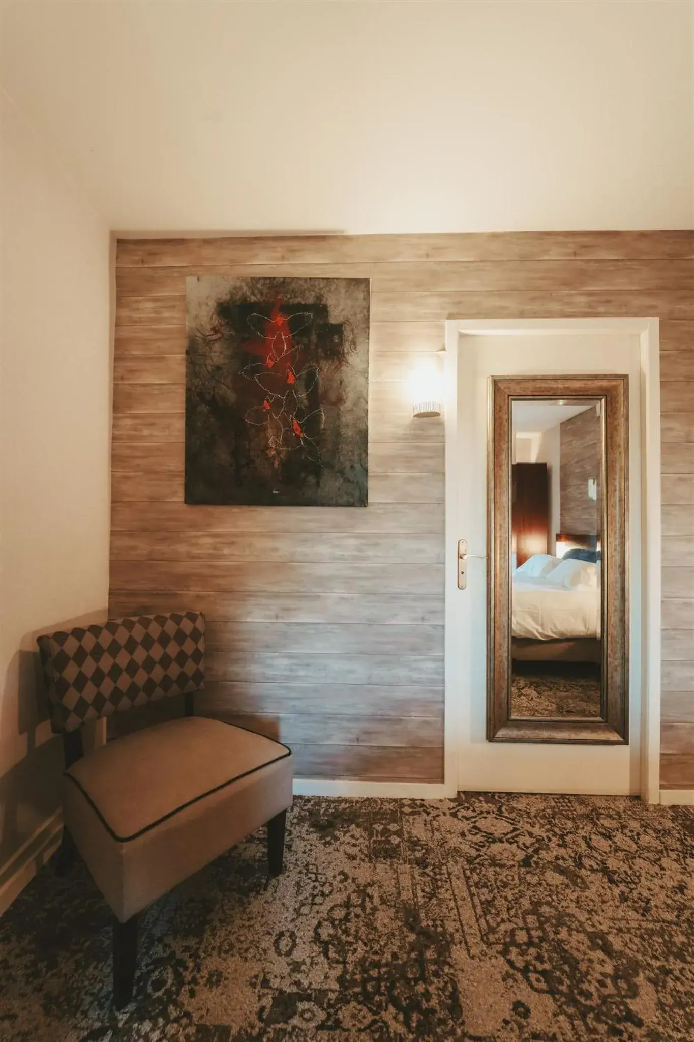 Decorative detail, Bed in Logis Hôtels Château de La Barge Decorative detail, Bed in Logis Hôtels Château de La Barge