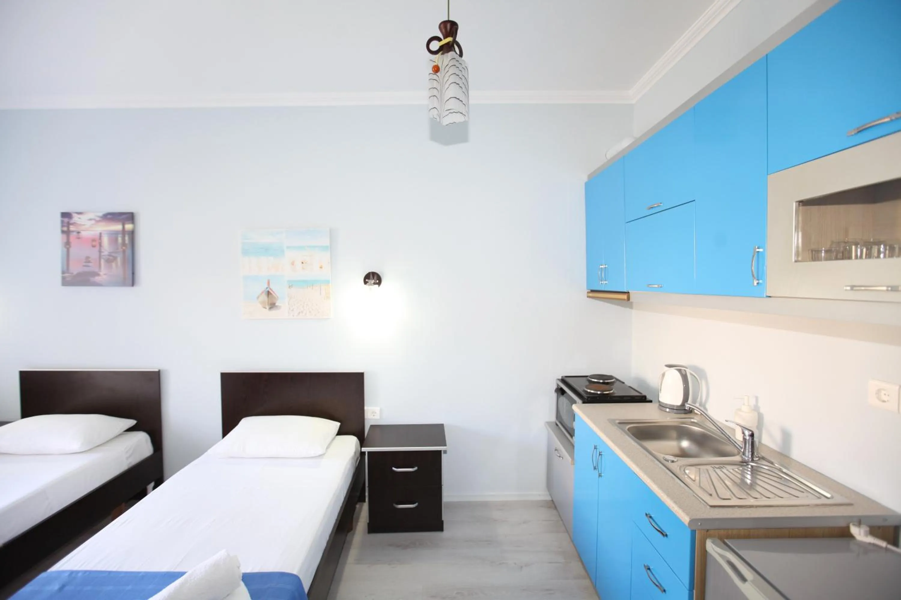 Kitchen or kitchenette, Bed in Keos Hotel
