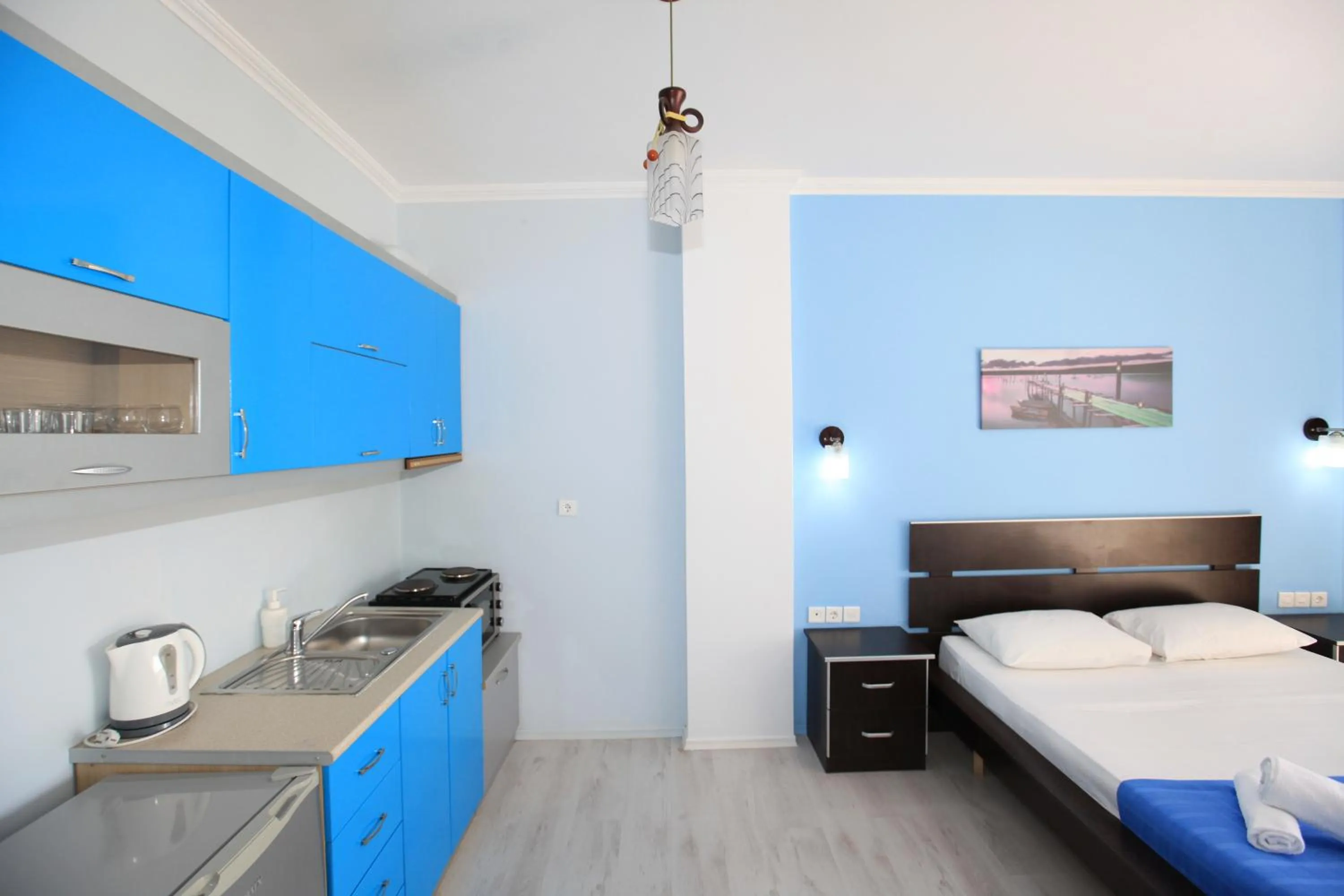 Kitchen or kitchenette, Bed in Keos Hotel