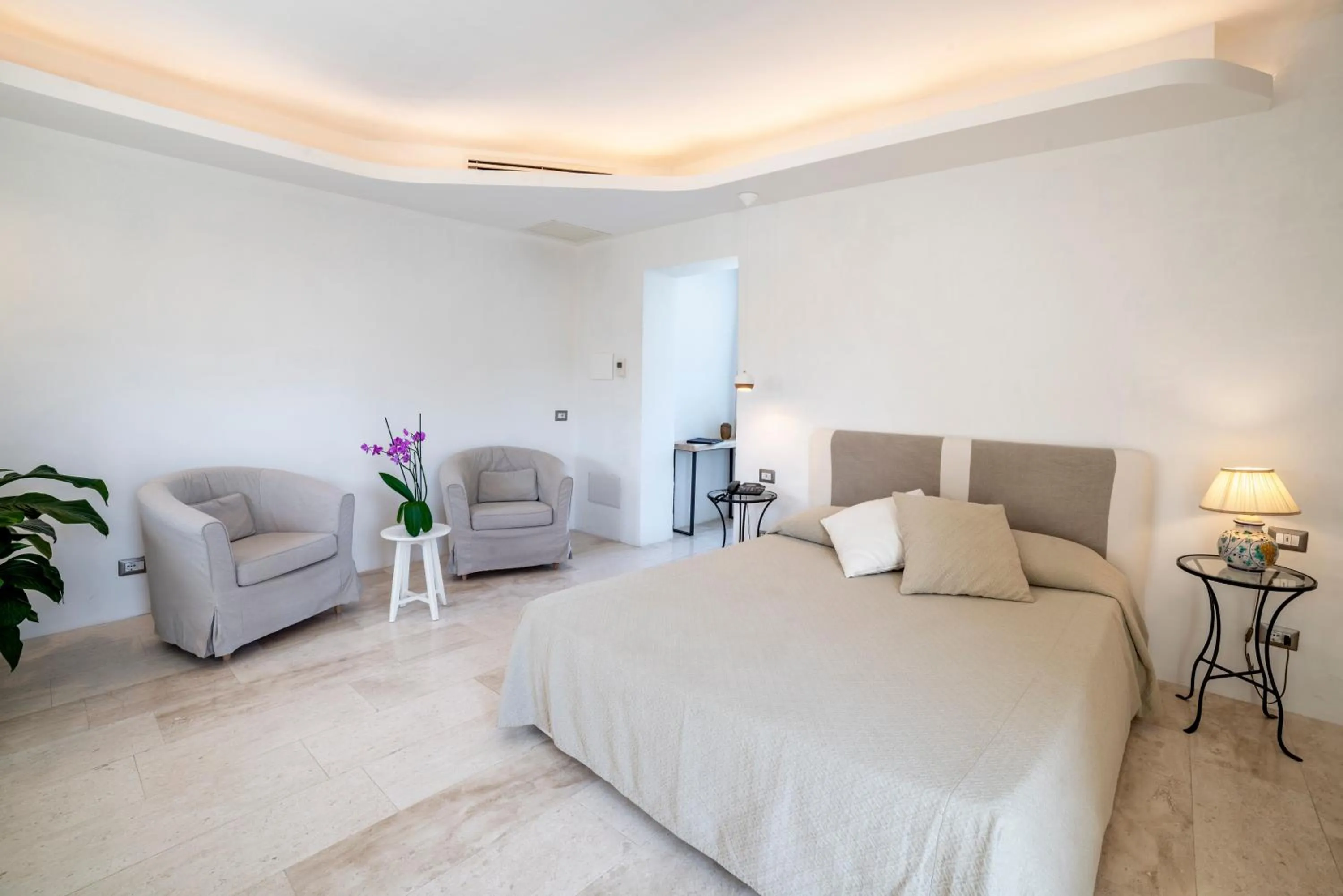 Bed in Hotel Grand Relais Dei Nuraghi