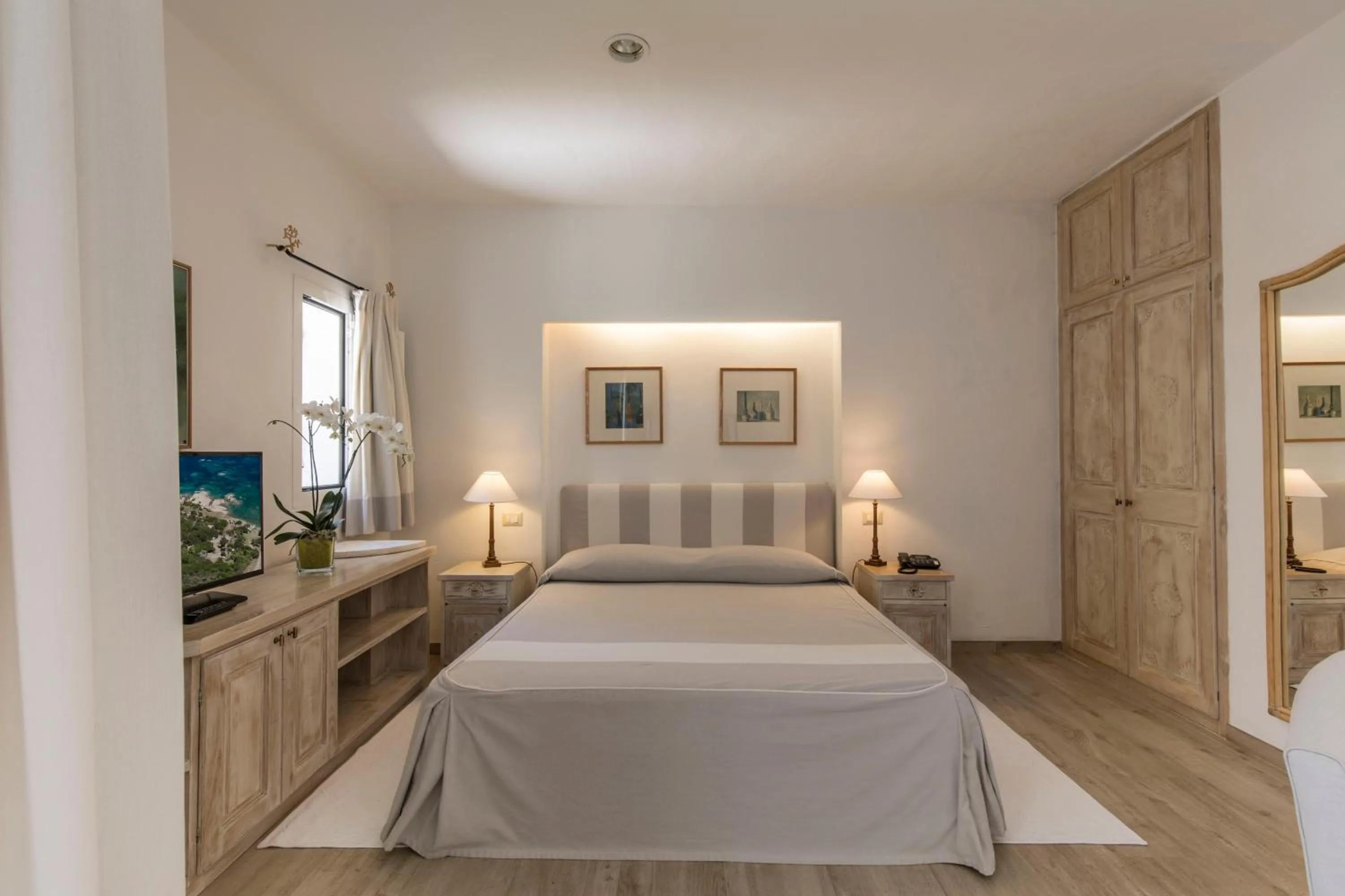 Bed in Hotel Grand Relais Dei Nuraghi