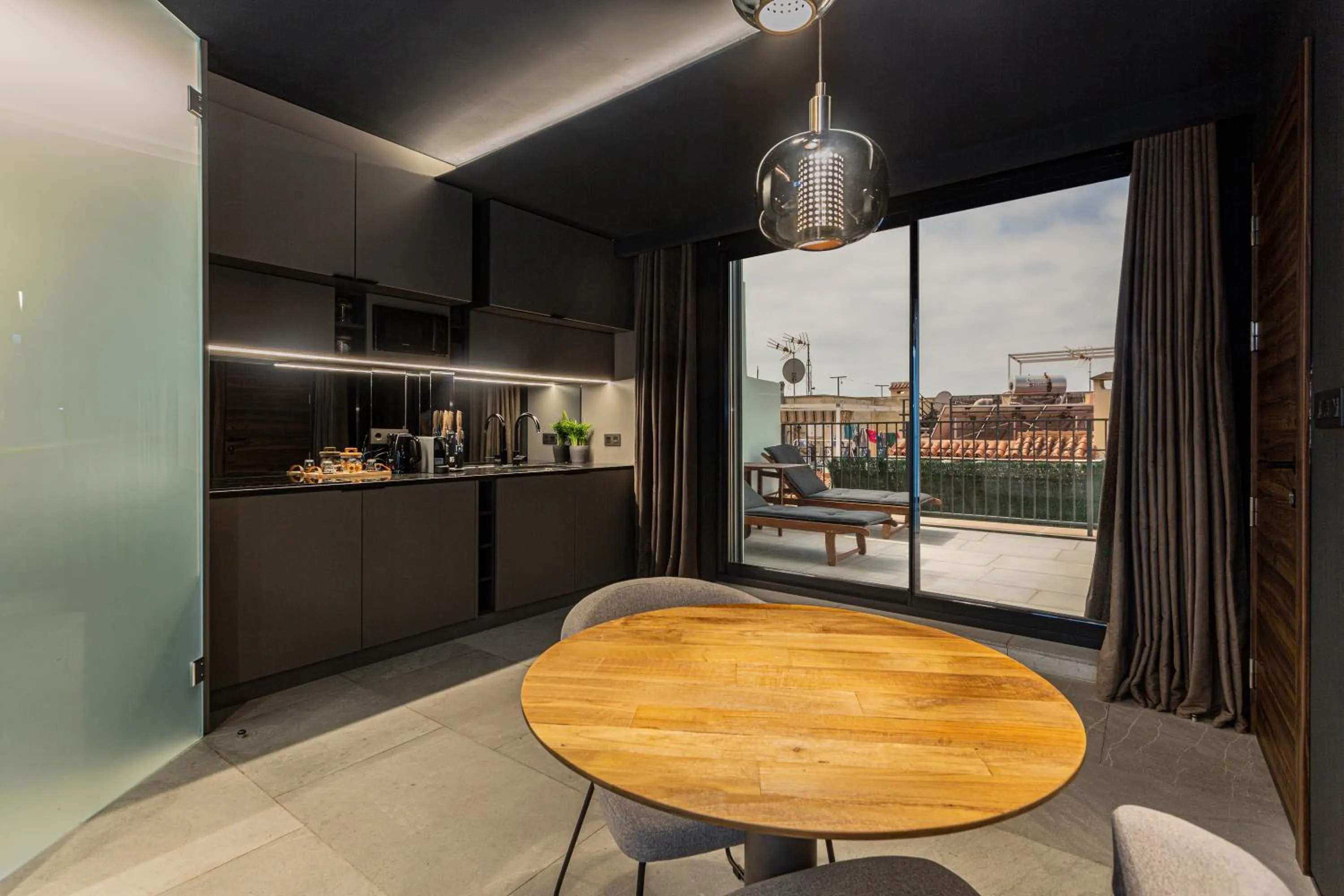 Kitchen or kitchenette in Apartaestudios Evolution Luxury