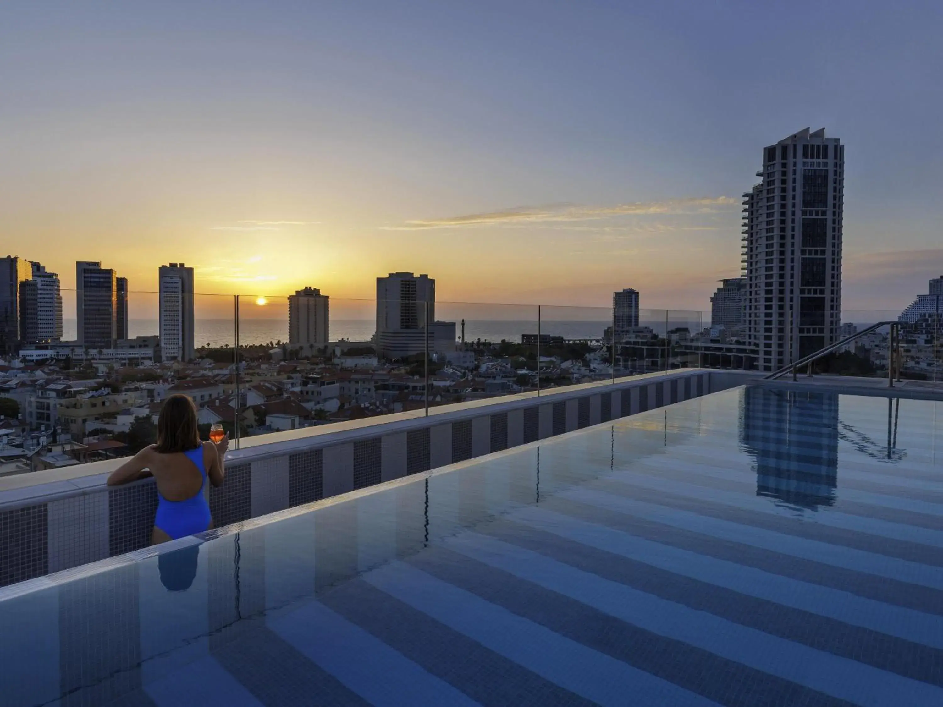 Pool view in Elkonin Tel Aviv - MGallery Hotel Collection Pool view in Elkonin Tel Aviv - MGallery Hotel Collection