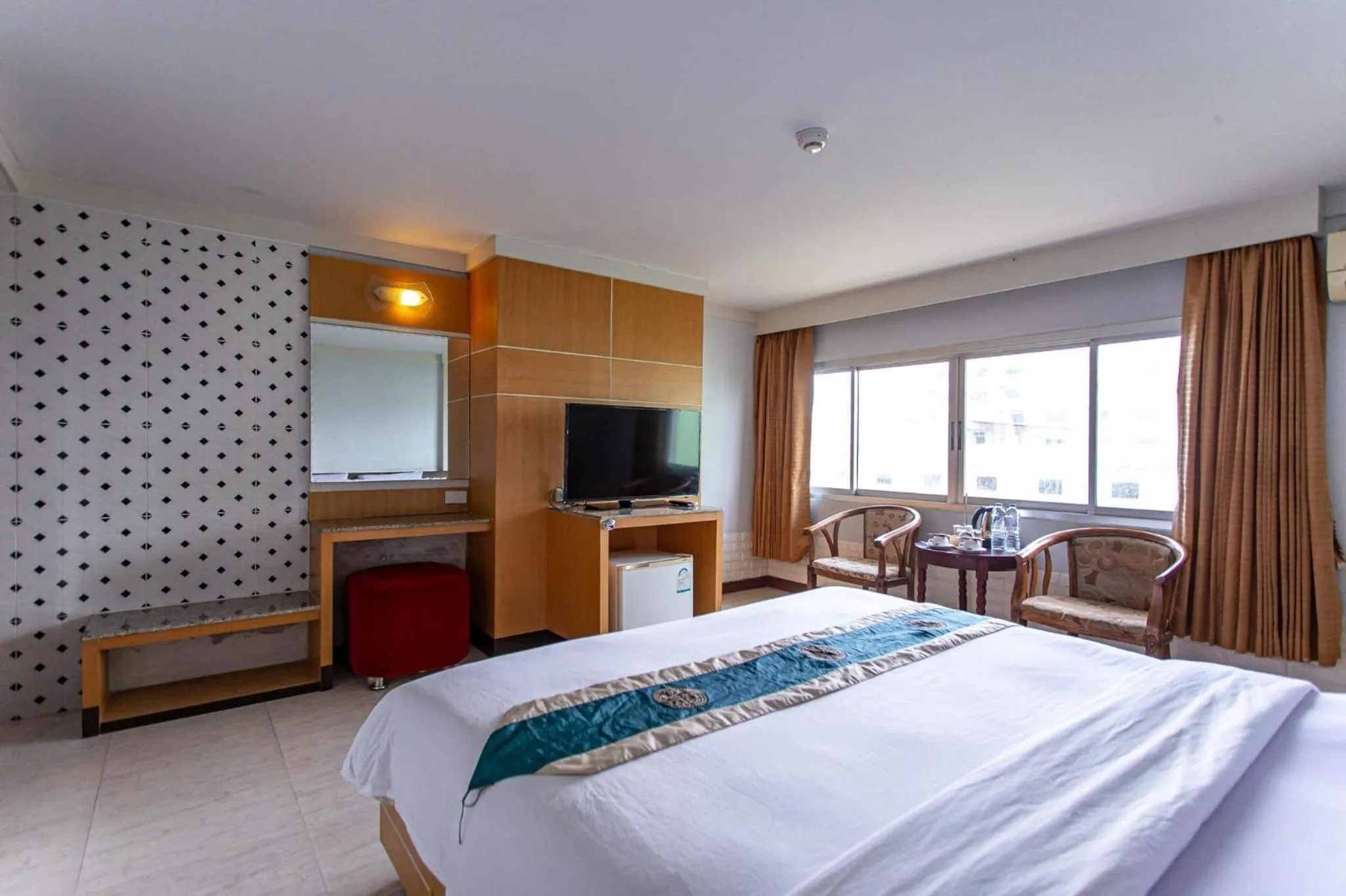 Bed in Satit Grand View Hotel