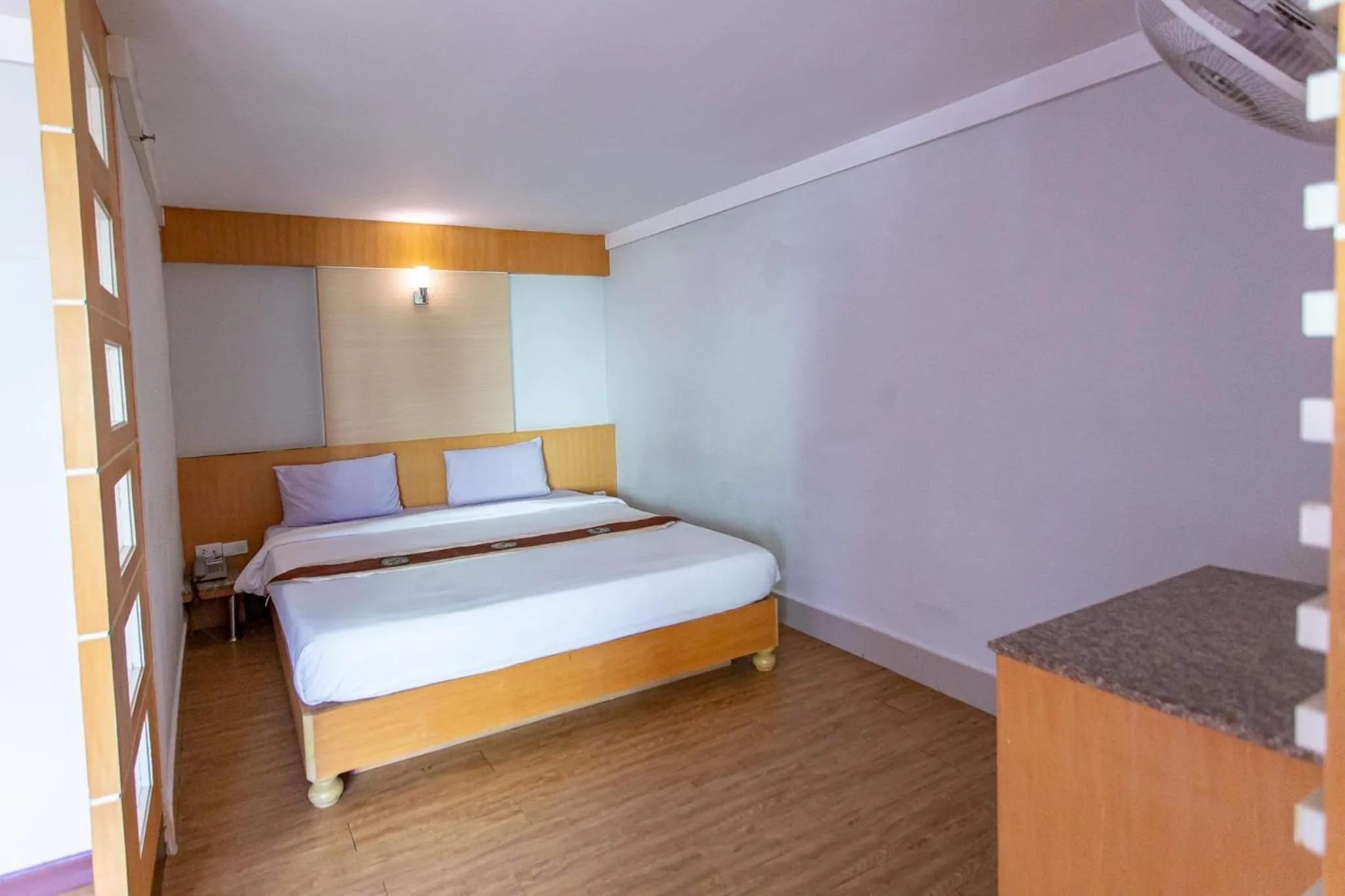 Bed in Satit Grand View Hotel