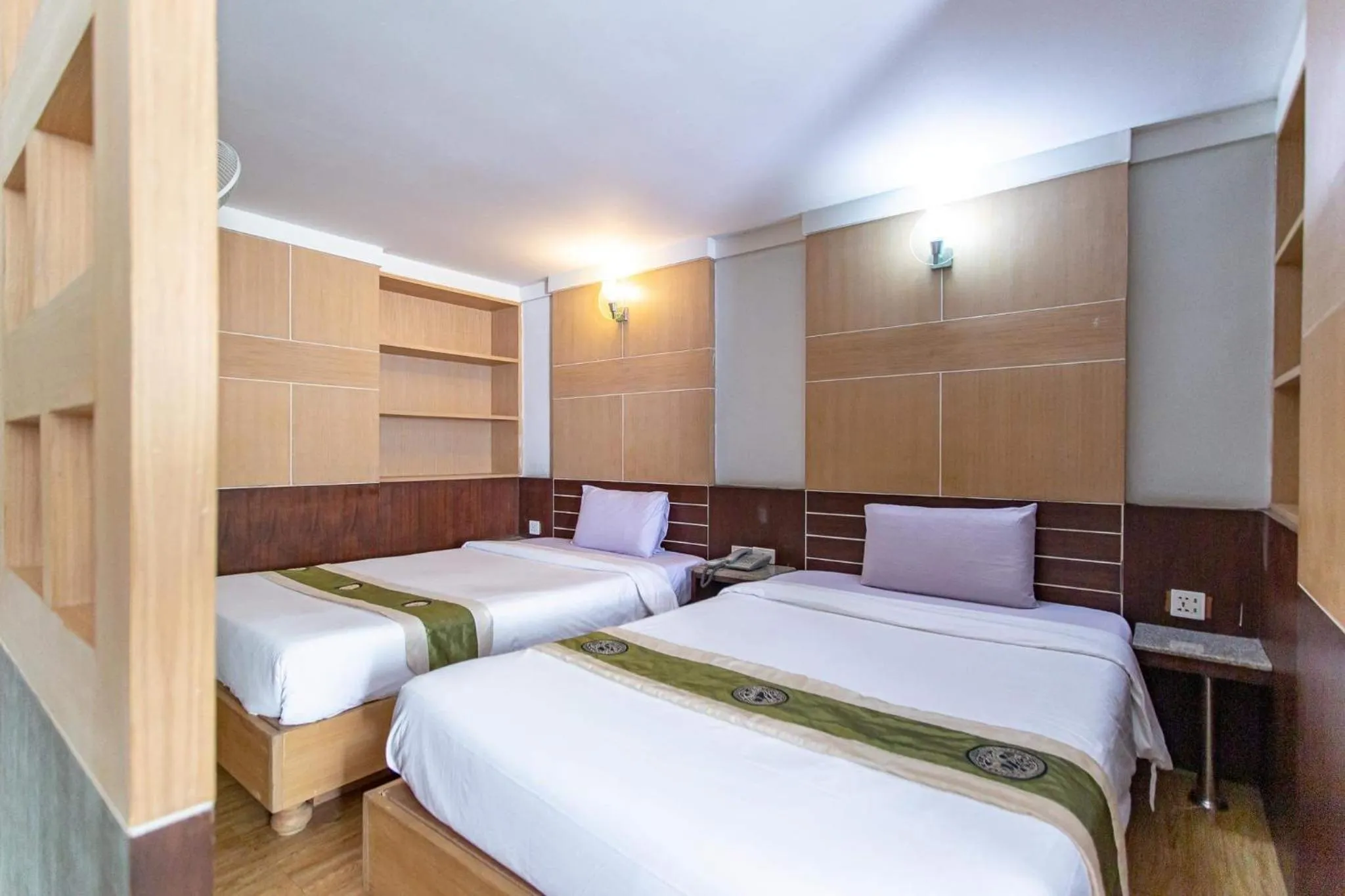 Bed in Satit Grand View Hotel