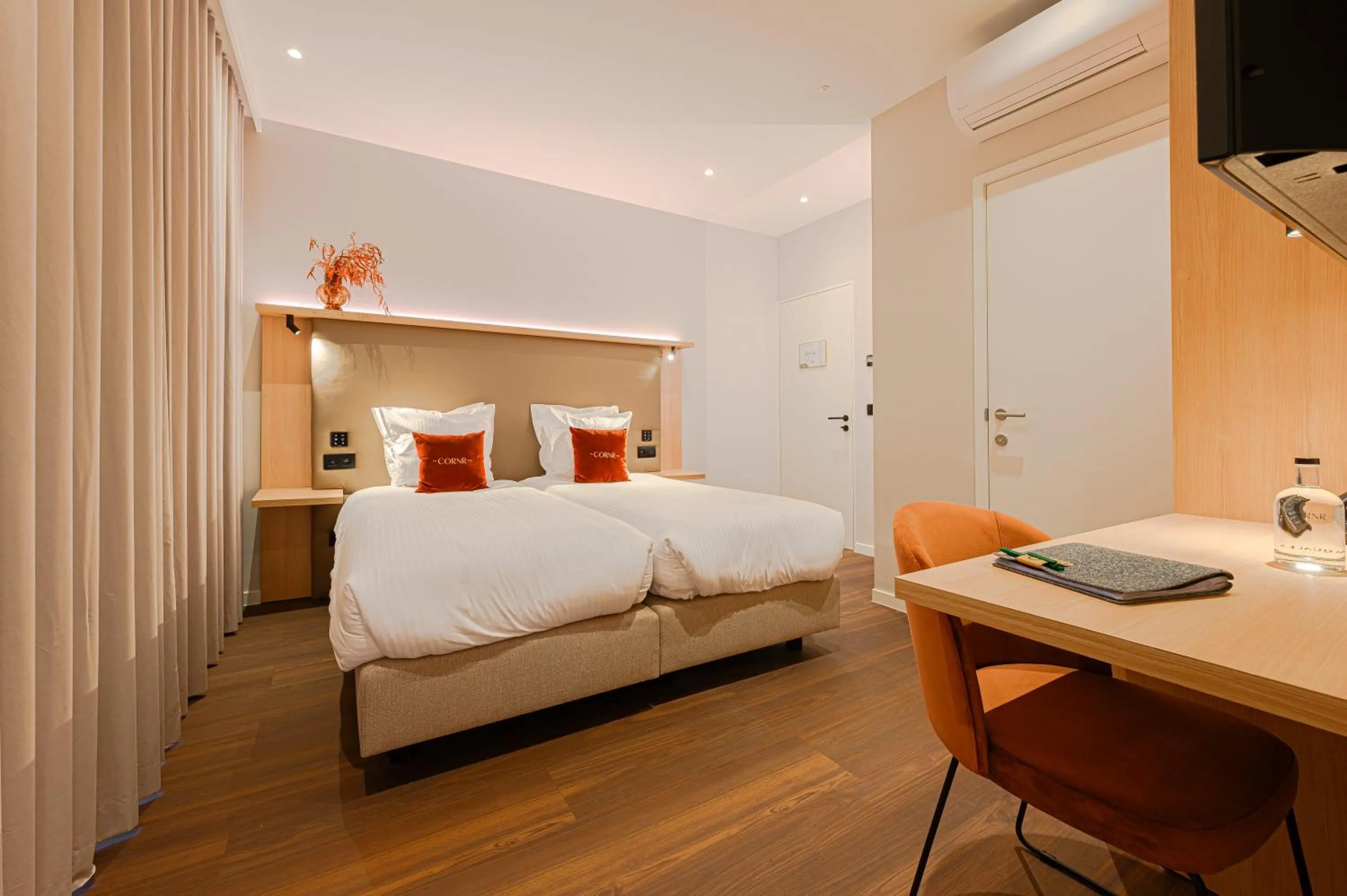 Bed in The CORNR Hotel