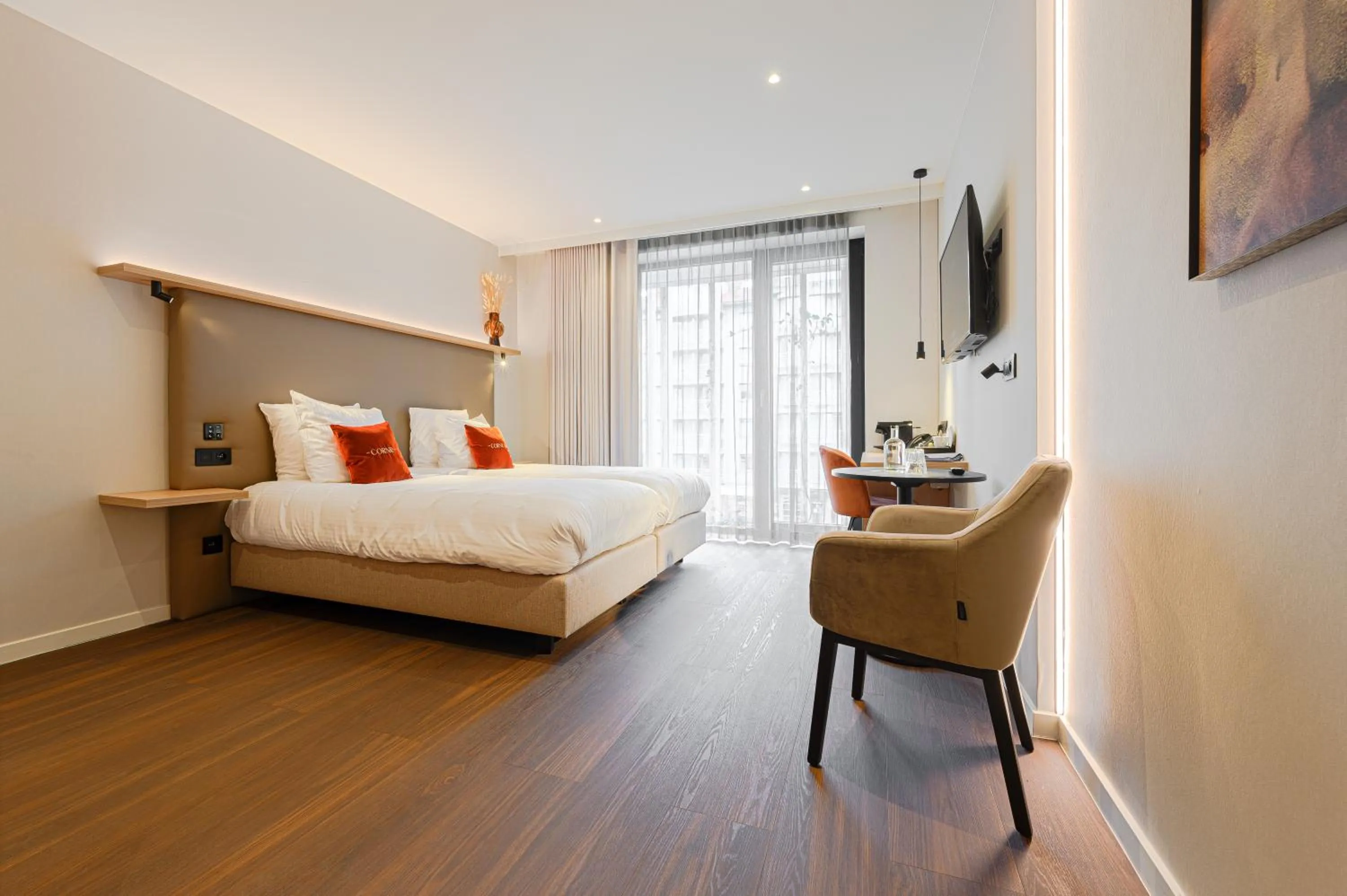 Bed in The CORNR Hotel