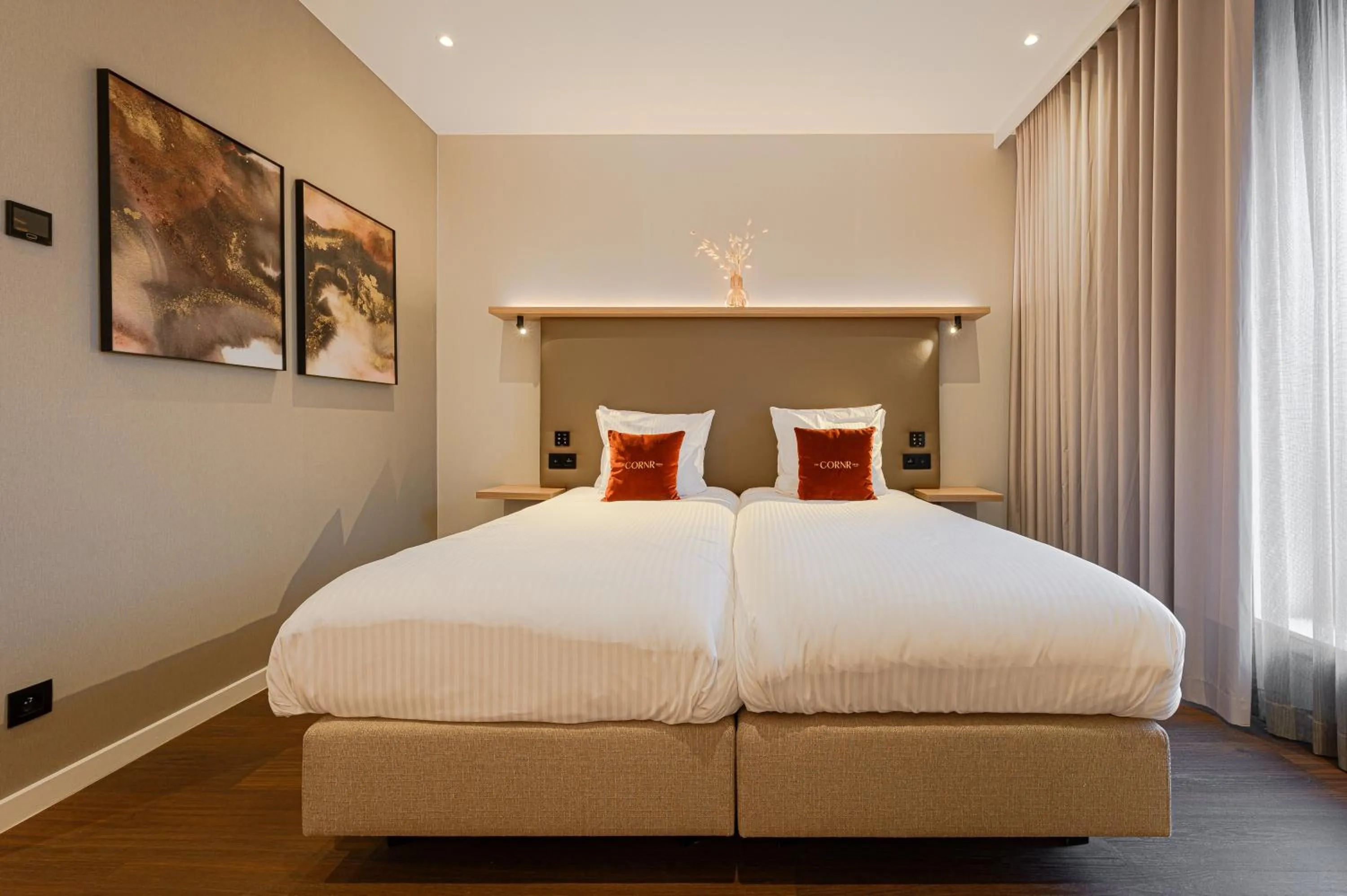 Bed in The CORNR Hotel