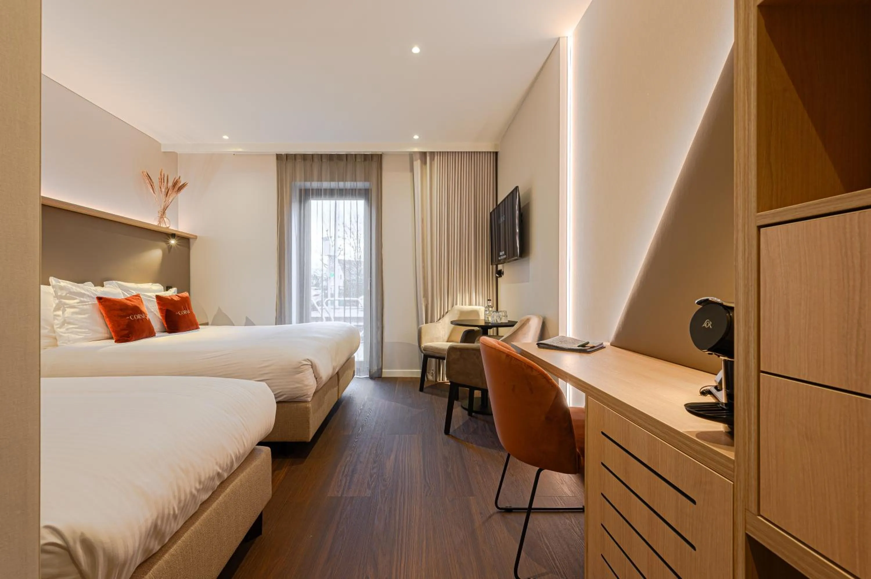 Bed in The CORNR Hotel