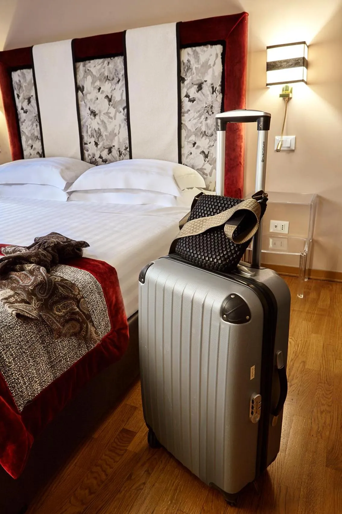 Decorative detail, Bed in Trianon Borgo Pio Aparthotel