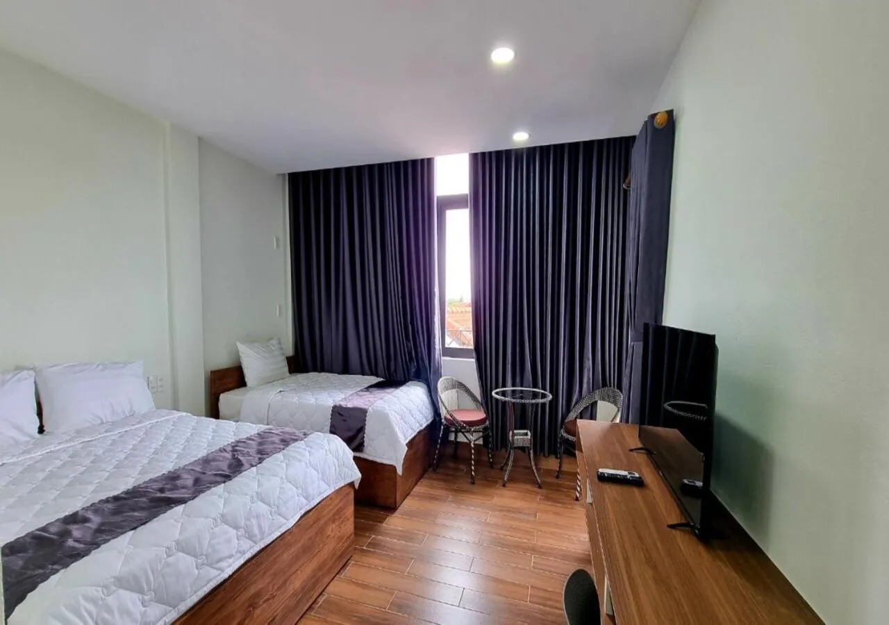 Photo of the whole room, Bed in Golden Star Villa Hue