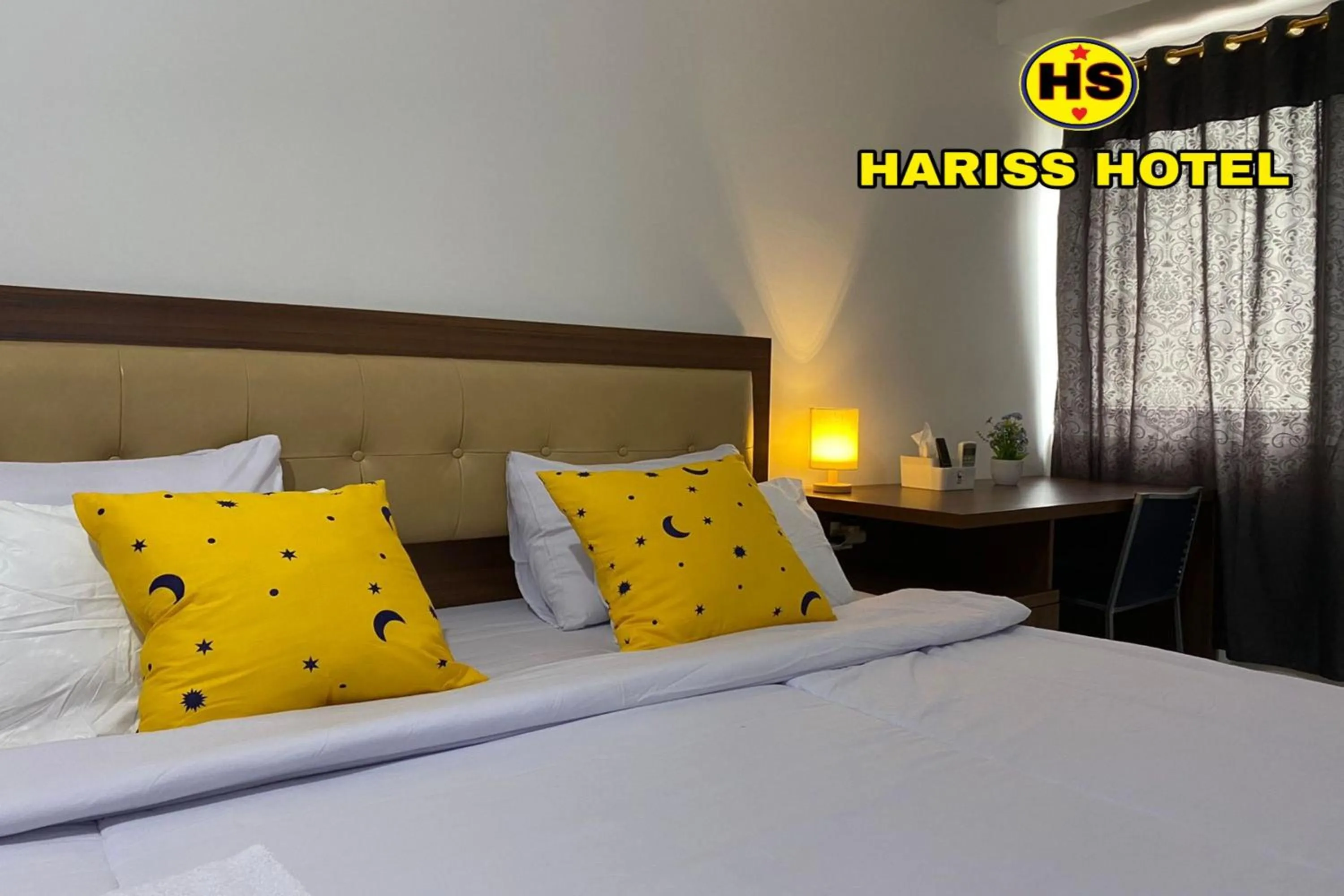 Bedroom in Hariss Inn Bandara