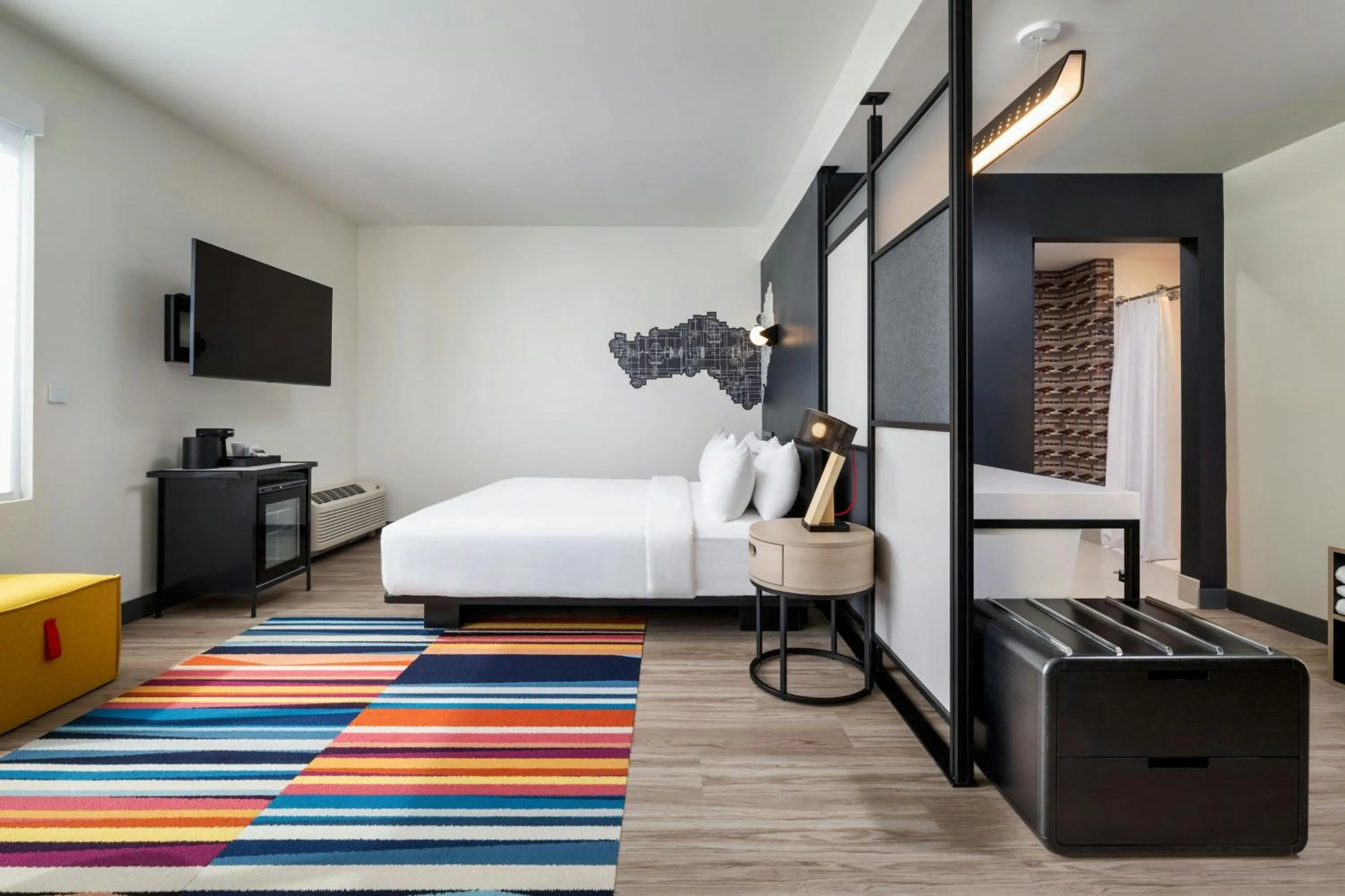 Photo of the whole room, Bed in Aloft Florence