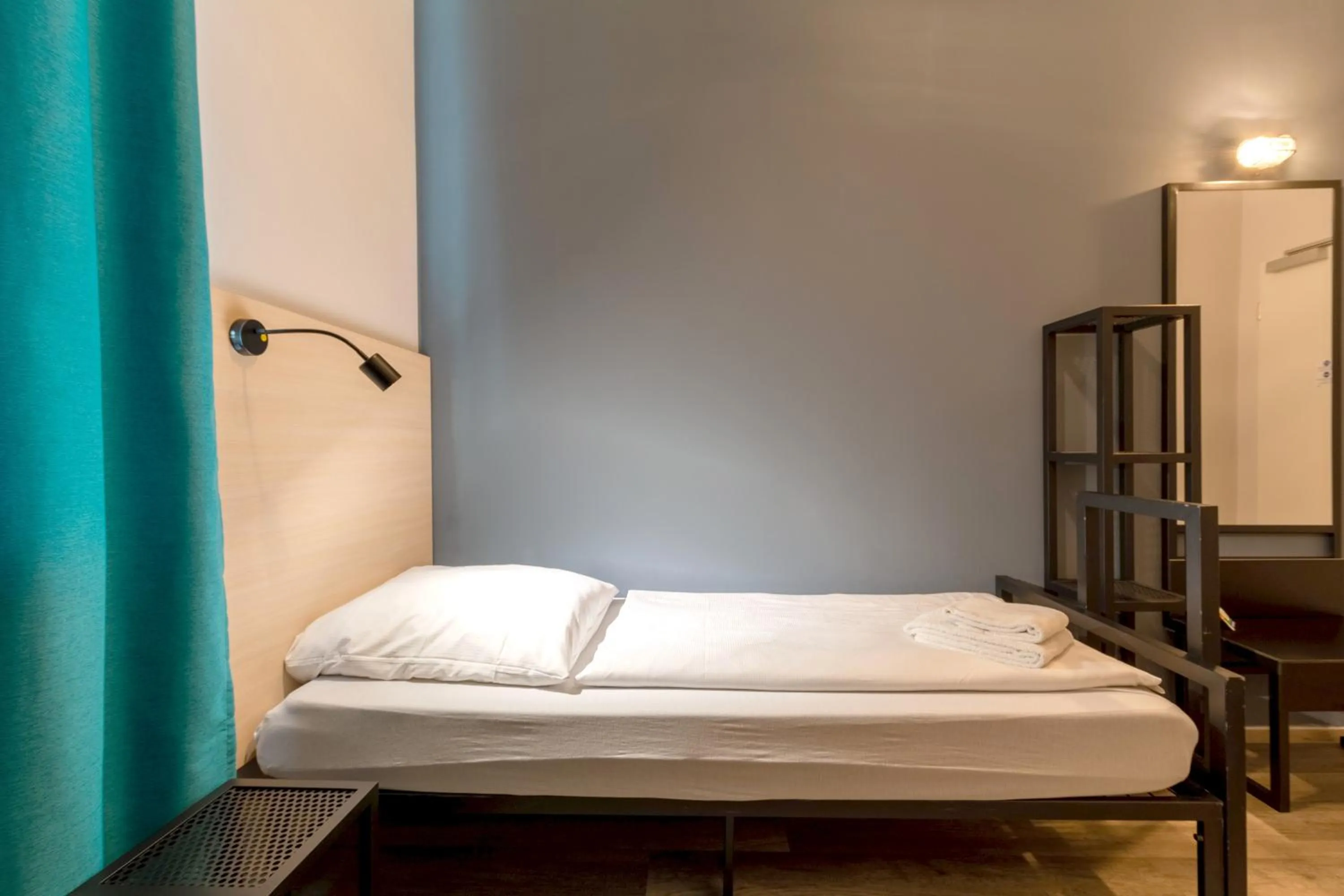 Photo of the whole room, Bed in a&o München Laim