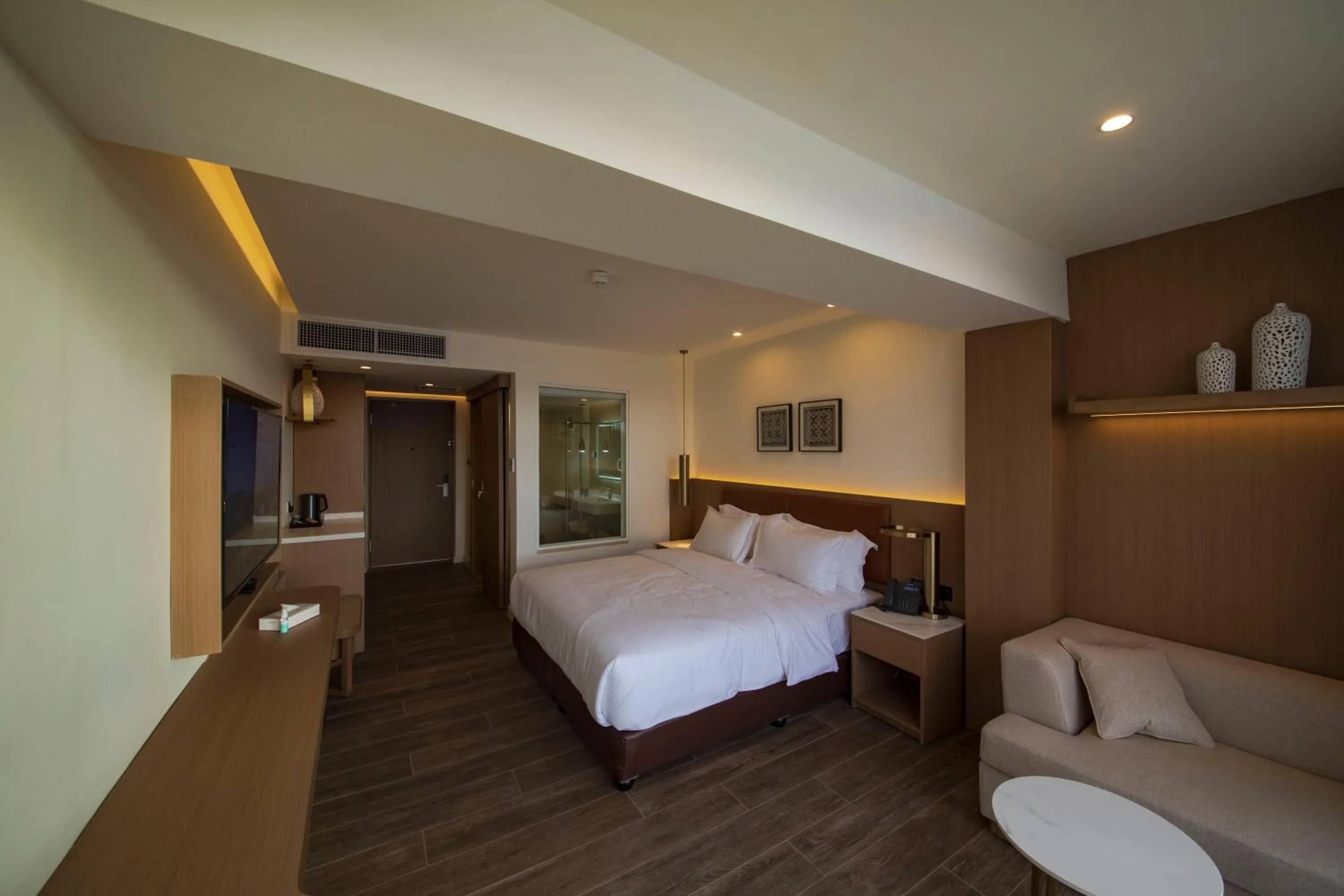 Photo of the whole room, Bed in Luxotel Aqaba Beach Resort & Spa Only 15 years plus