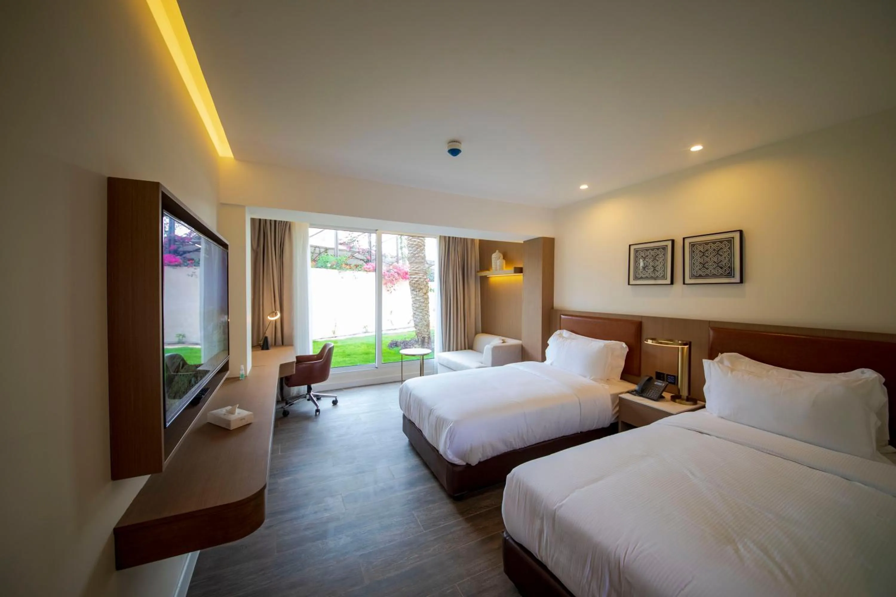 Photo of the whole room, Bed in Luxotel Aqaba Beach Resort & Spa Only 15 years plus