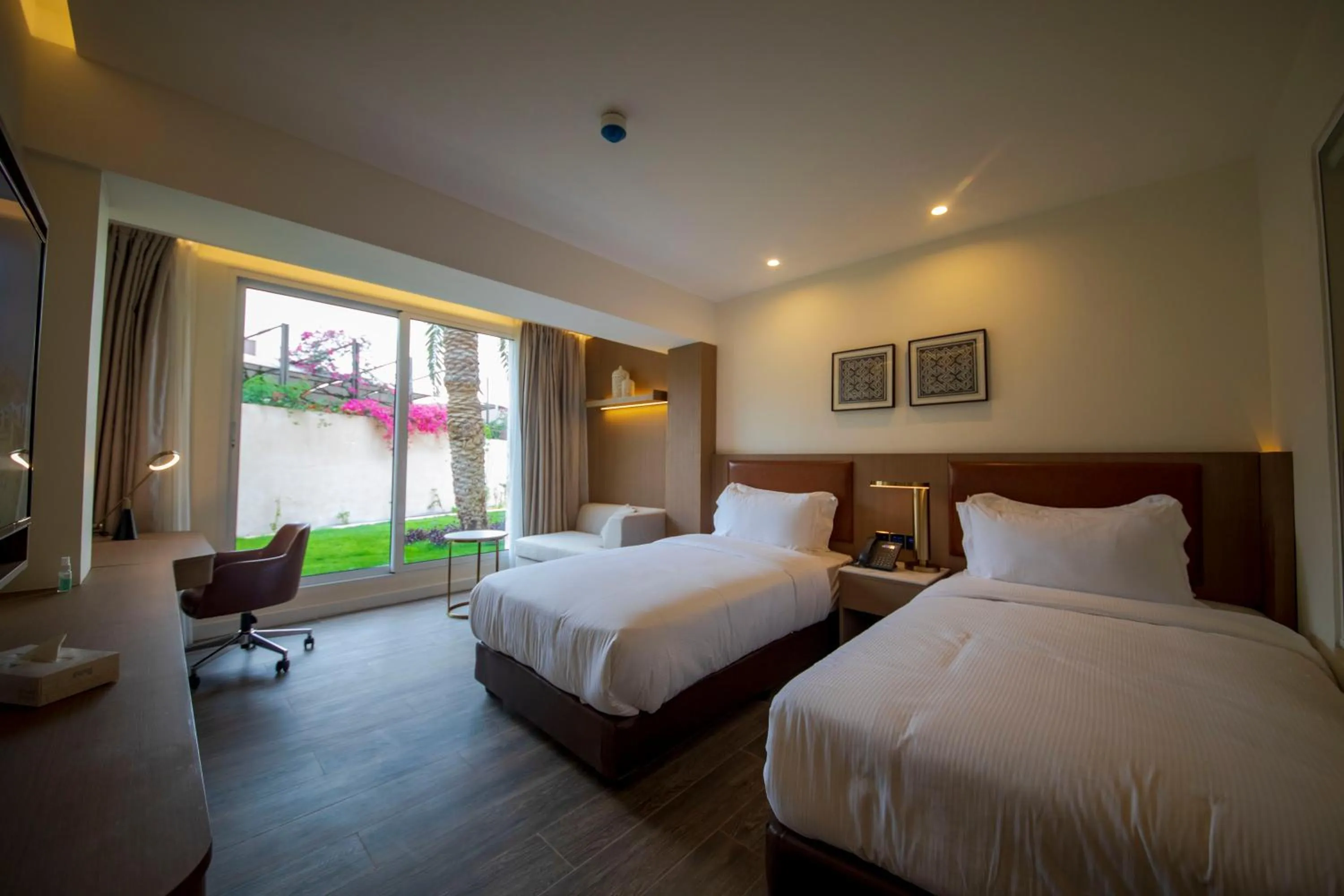 Photo of the whole room, Bed in Luxotel Aqaba Beach Resort & Spa Only 15 years plus