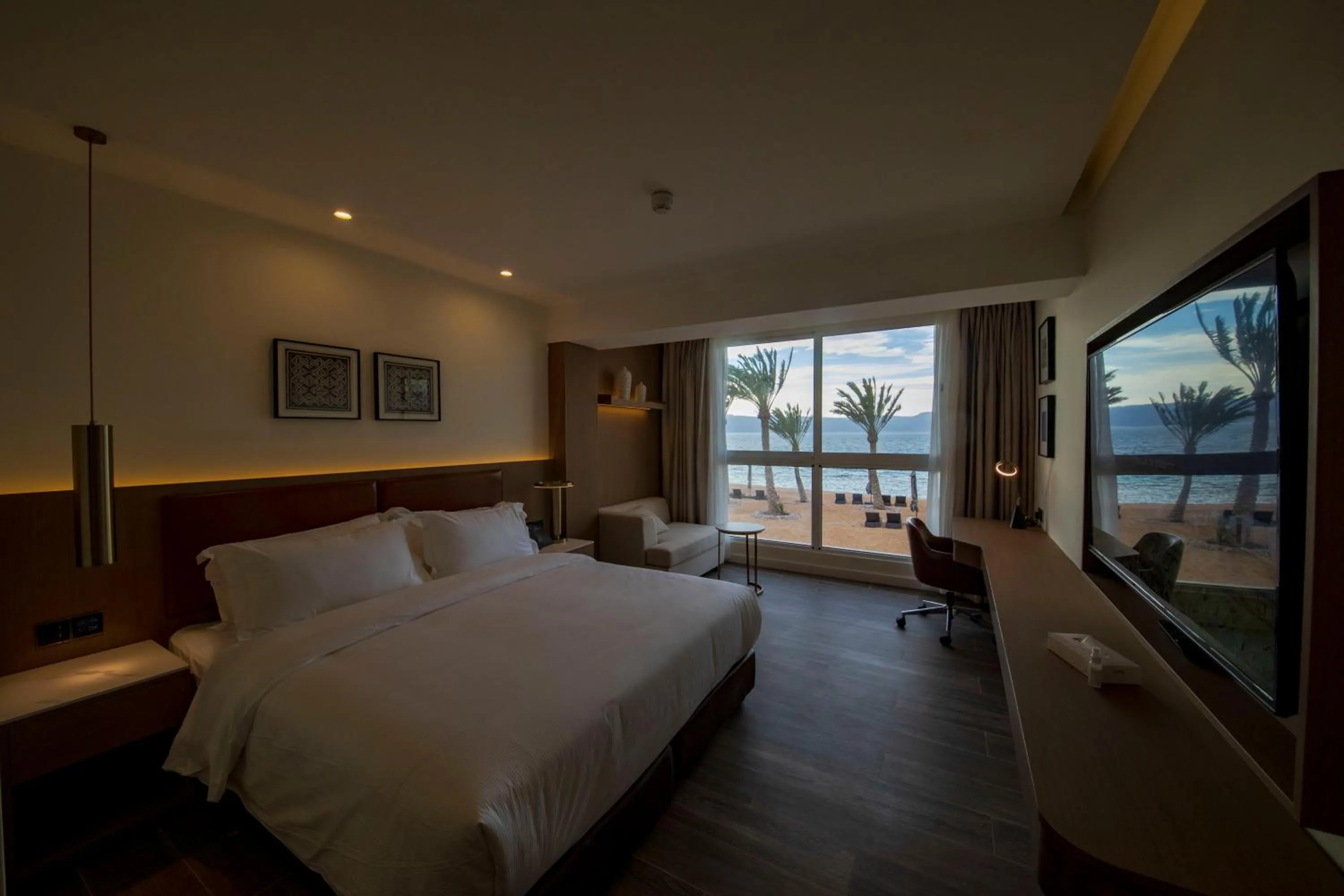 Photo of the whole room, Bed in Luxotel Aqaba Beach Resort & Spa Only 15 years plus