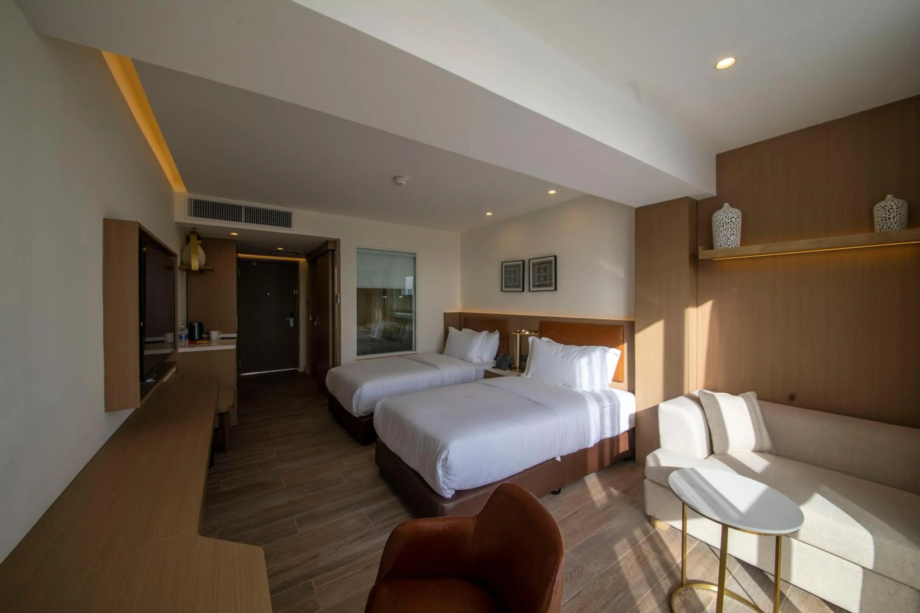 Photo of the whole room, Bed in Luxotel Aqaba Beach Resort & Spa Only 15 years plus