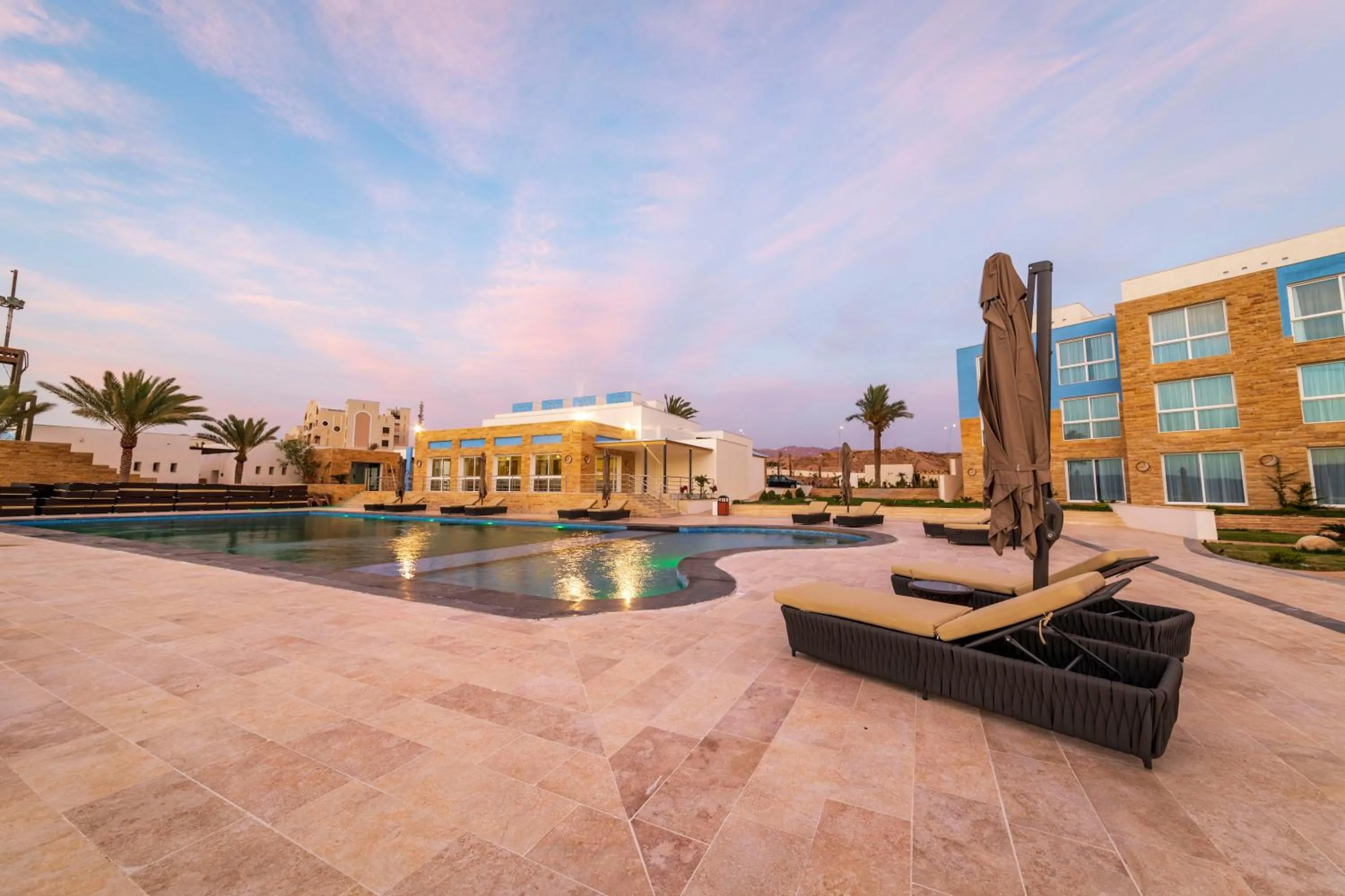 Swimming pool in Luxotel Aqaba Beach Resort & Spa Only 15 years plus