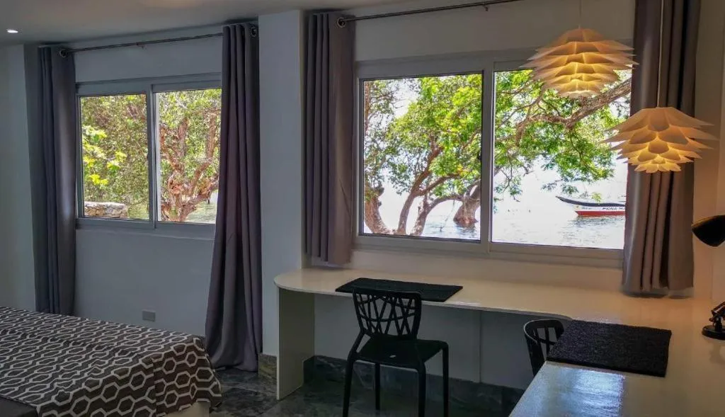 Bed in The Three P Beach Resort & Dive Center